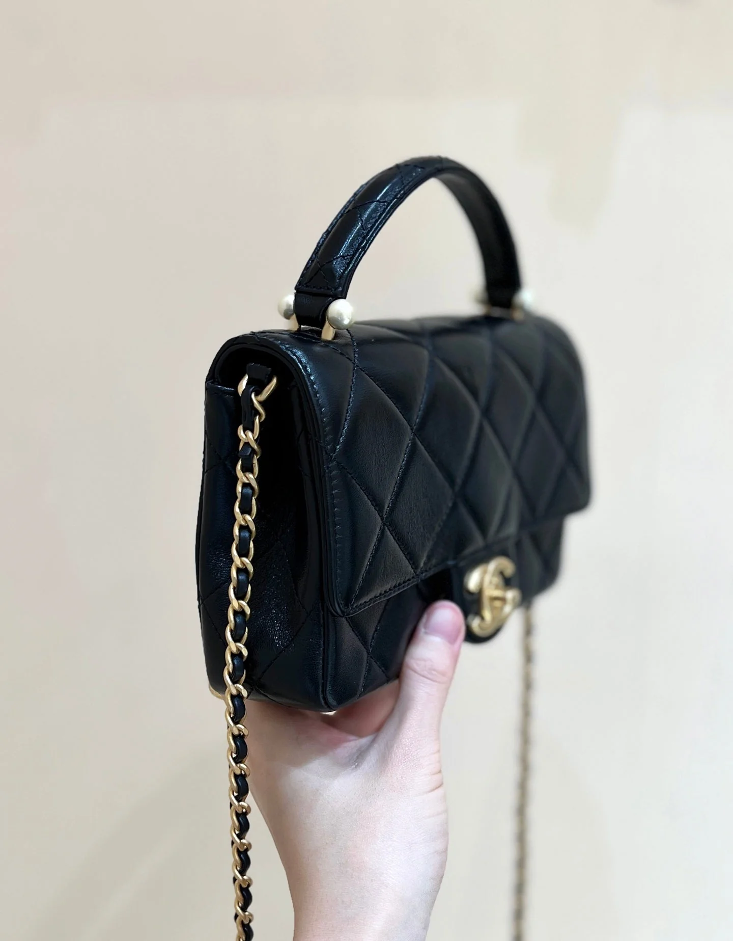 PEARL LIMITED EDITION FLAP BAG WITH HANDLE 20 IN BLACK LAMBSKIN