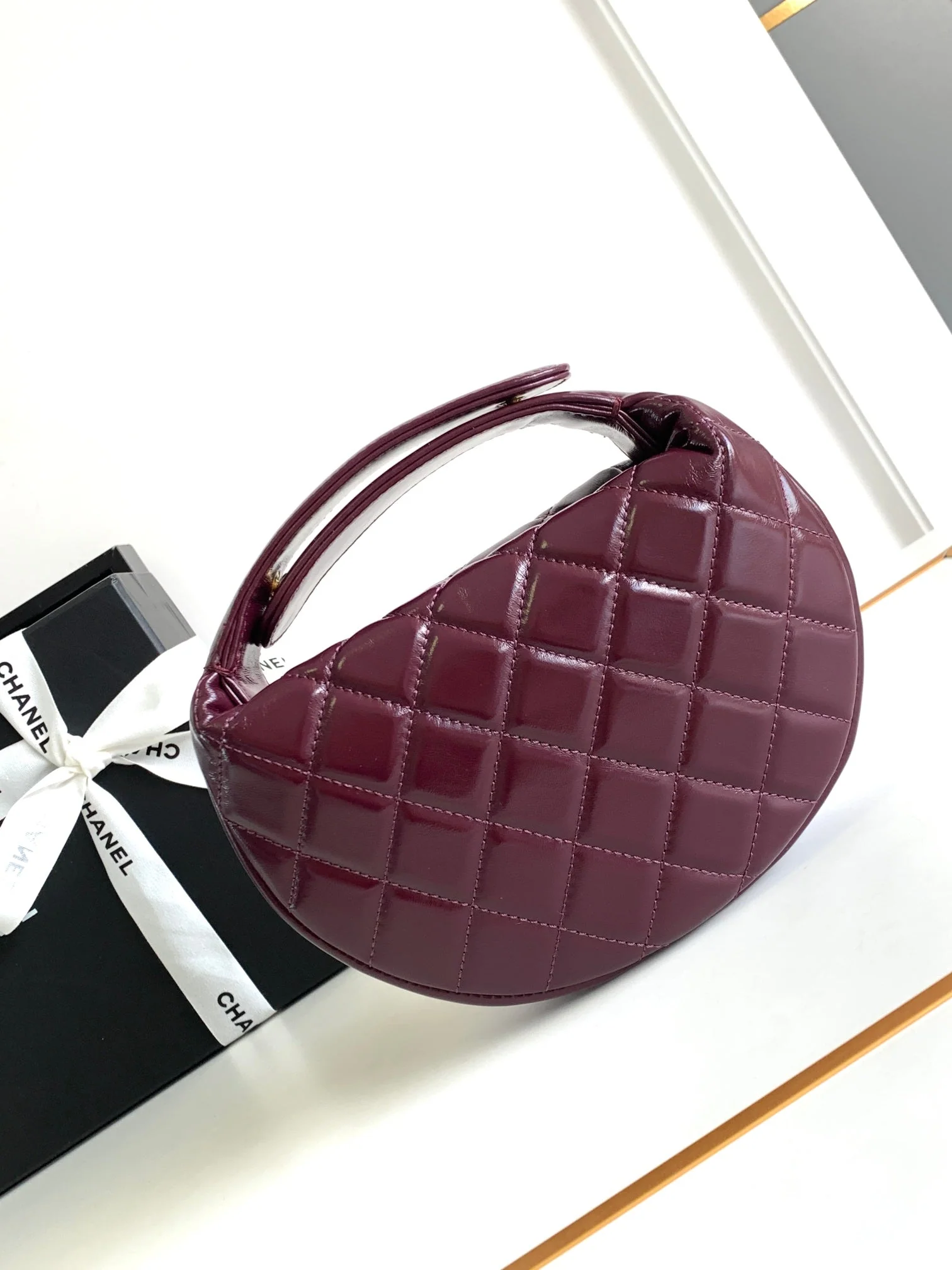 CC 16 MINI POUCH IN DARK RED WINE GRAINED CALFSKIN AND GOLD METAL