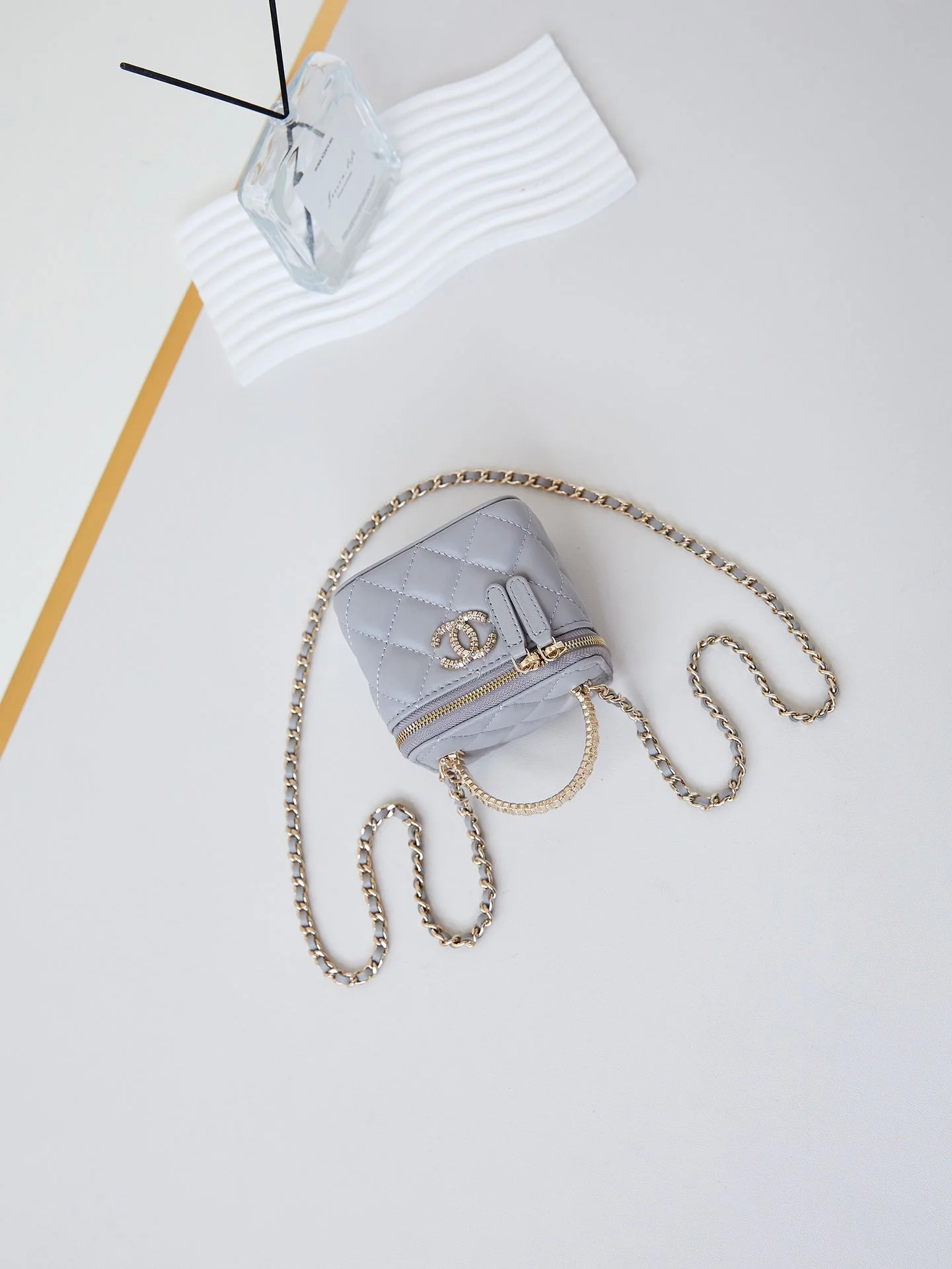 CHANEL 25S MINI VANITY BAG 11 CM IN GREY LAMBSKIN WITH CRYSTAL-EMBELLISHED CC LOGO
