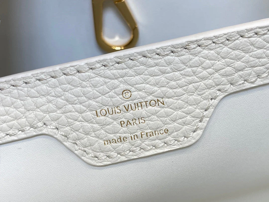 CAPUCINES MM 31 WHITE TAURILLON GOLD HARDWARE