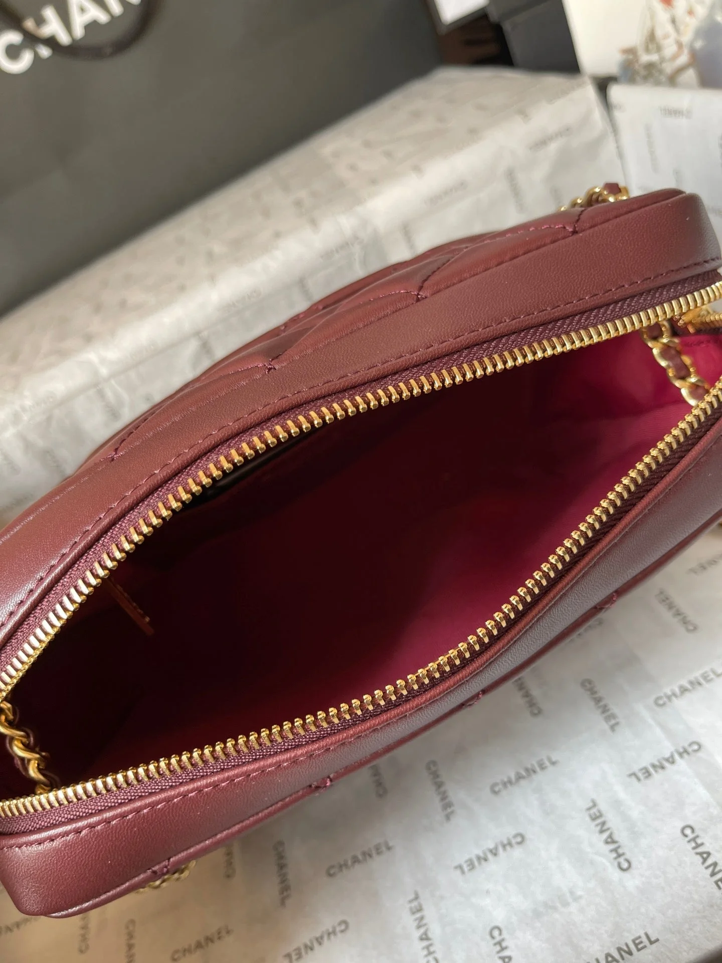 CAMERA BAG 24 IN BUCCANEER RED QUILTED LAMBSKIN DOUBLE C GOLD COIN