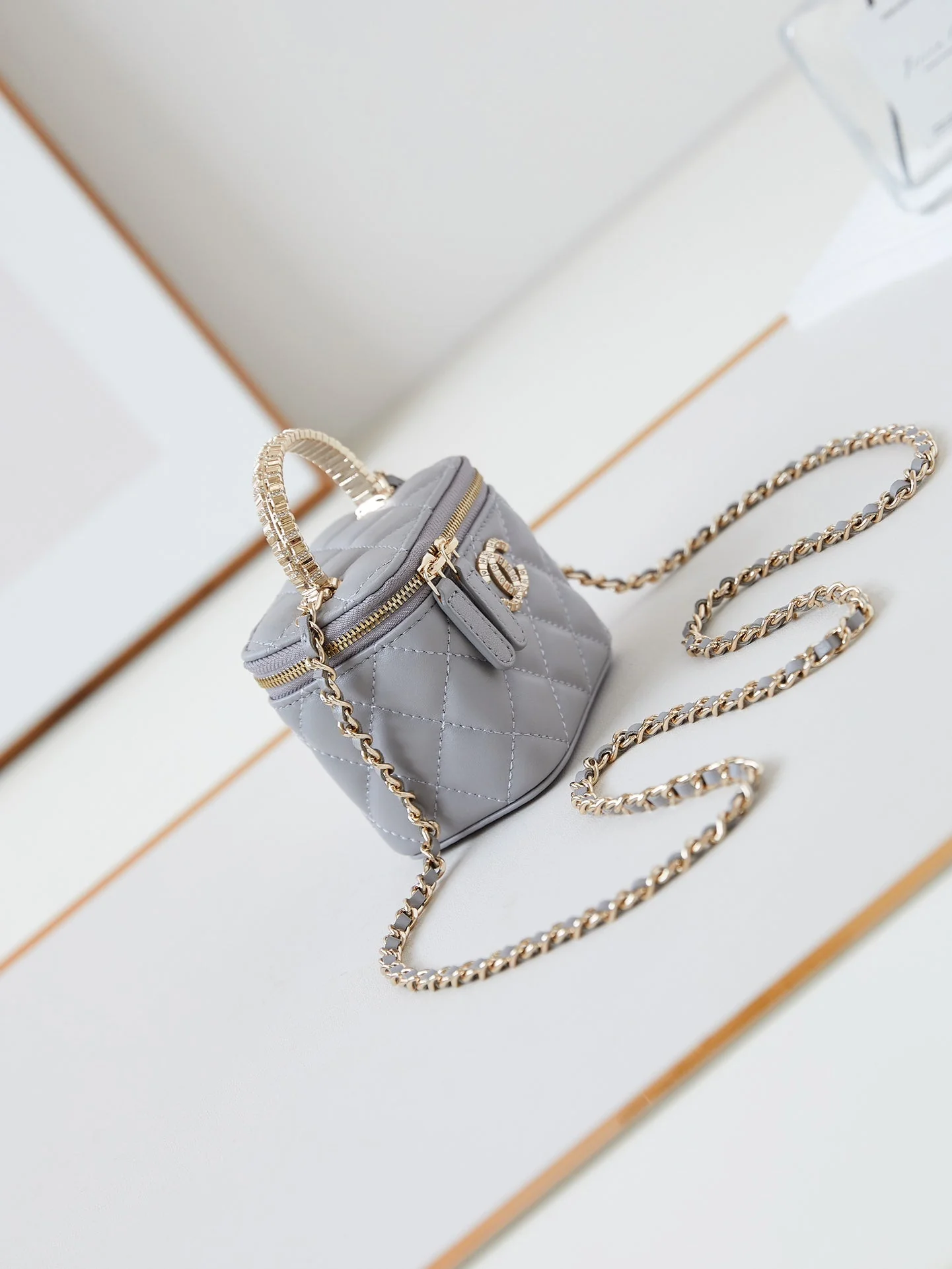 CHANEL 25S MINI VANITY BAG 11 CM IN GREY LAMBSKIN WITH CRYSTAL-EMBELLISHED CC LOGO