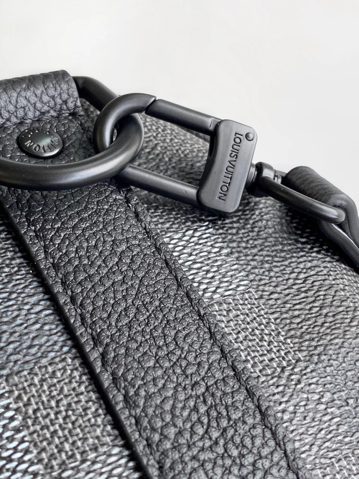 LV 25S KEEPALL BANDOULIÈRE 25 BAG IN DAMOFLAGE BLACK CALFSKIN