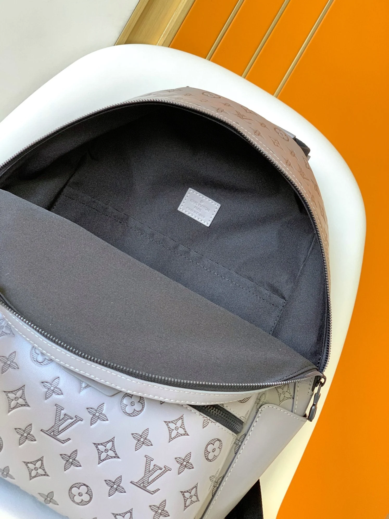 DISCOVERY BACKPACK 38 IN GREY MONOGRAM ECLIPSE CANVAS AND TAURILLON