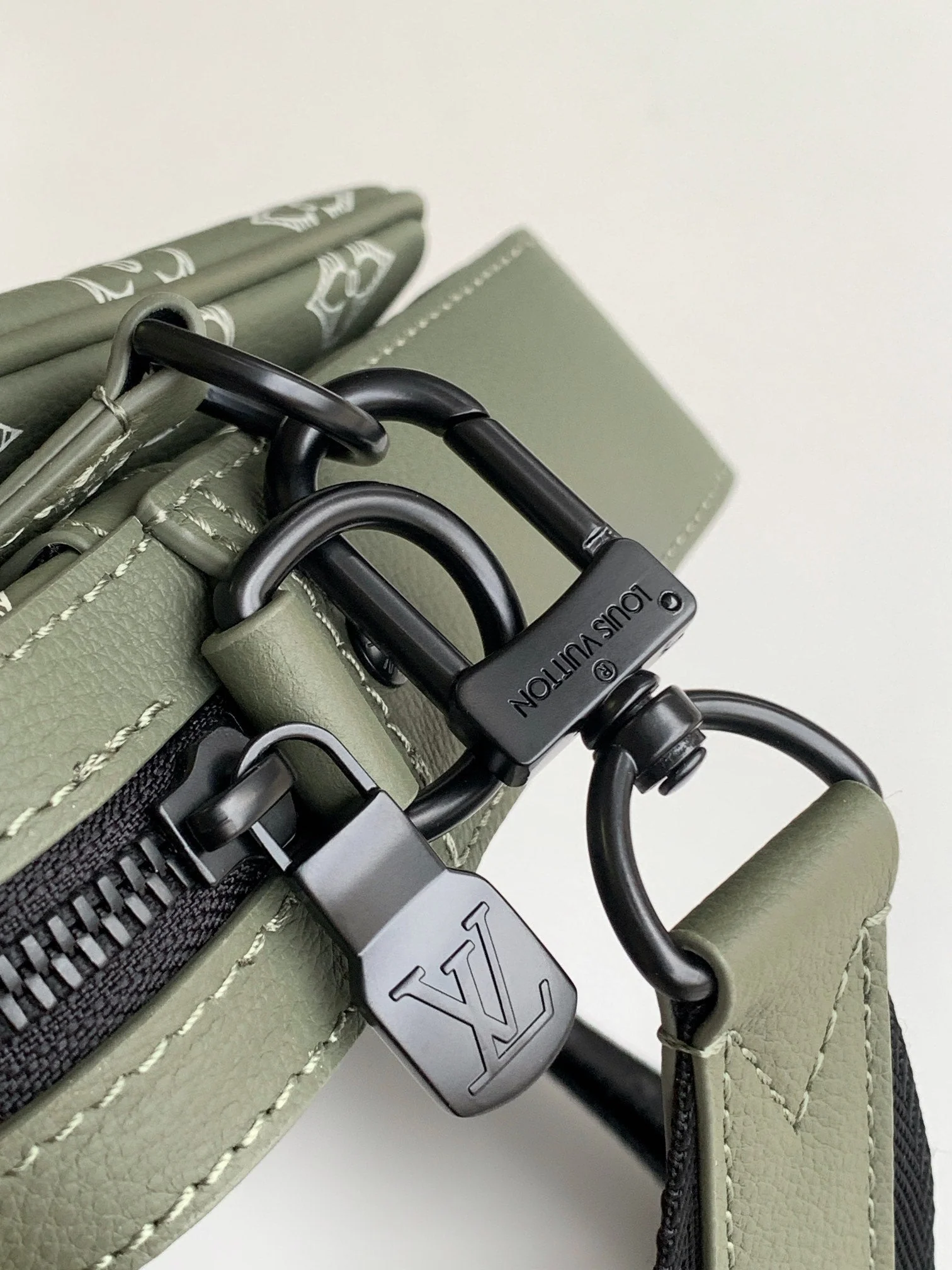 TRIO MESSENGER BAG 25 IN GREEN MONOGRAM SHADOW CALFSKIN