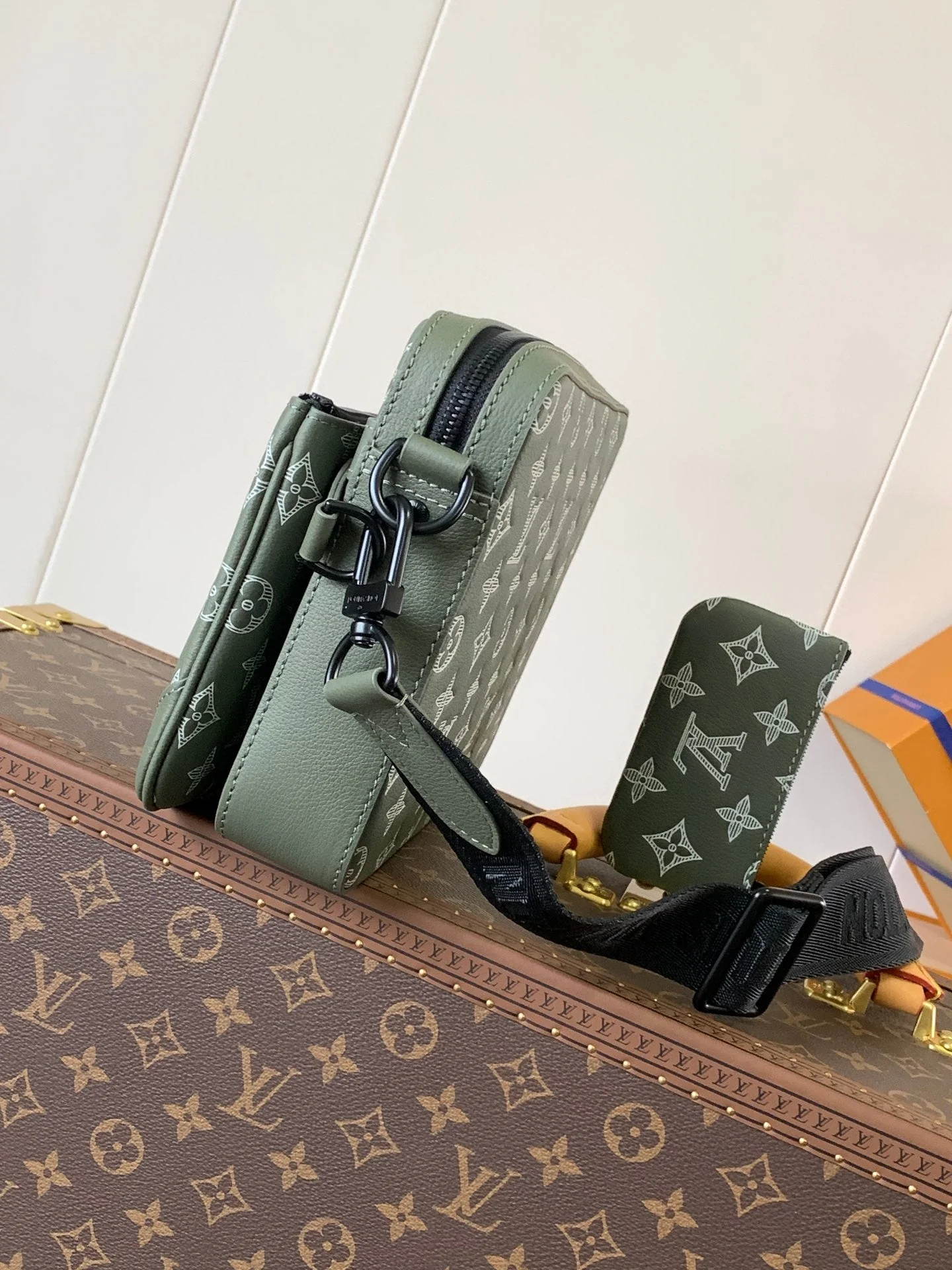 TRIO MESSENGER BAG 25 IN GREEN MONOGRAM SHADOW CALFSKIN