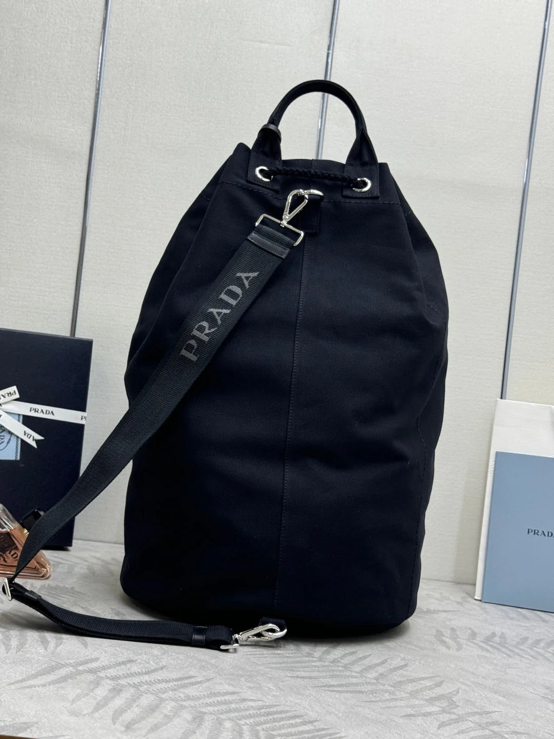 PRADA 25S DRAWSTRING BACKPACK 55 IN BLACK CANVAS LINEN SILVER HARDWARE