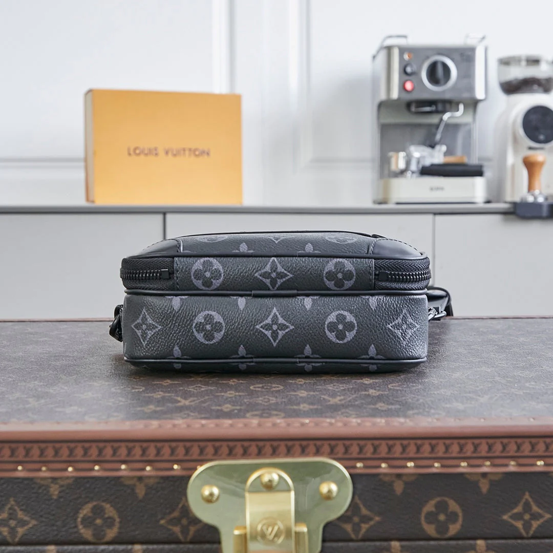 NANO ALPHA 18 IN BLACK MONOGRAM ECLIPSE CANVAS