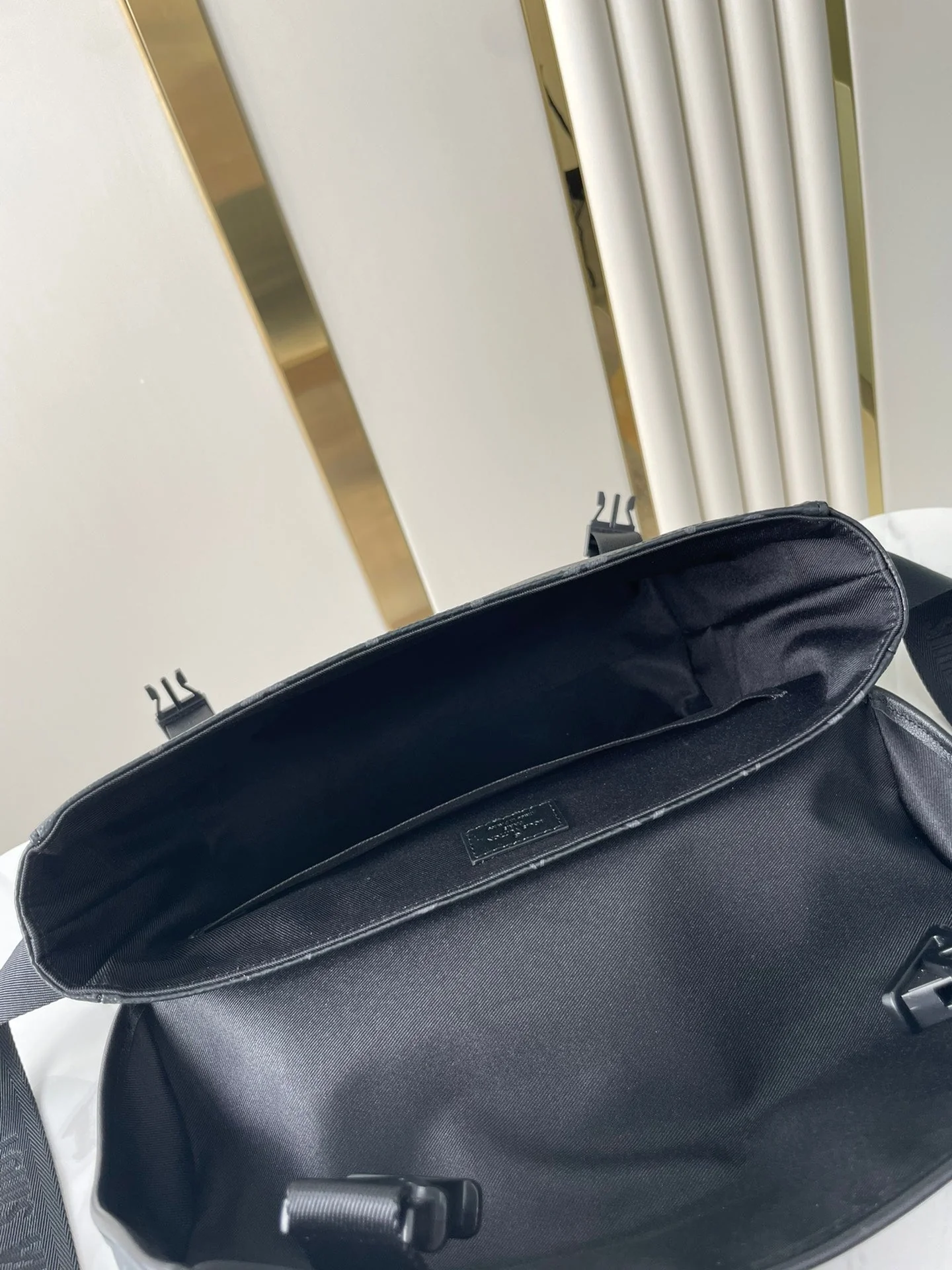 MESSENGER VOYAGER PM 33 IN GUN METAL MONOGRAM ECLIPSE CANVAS