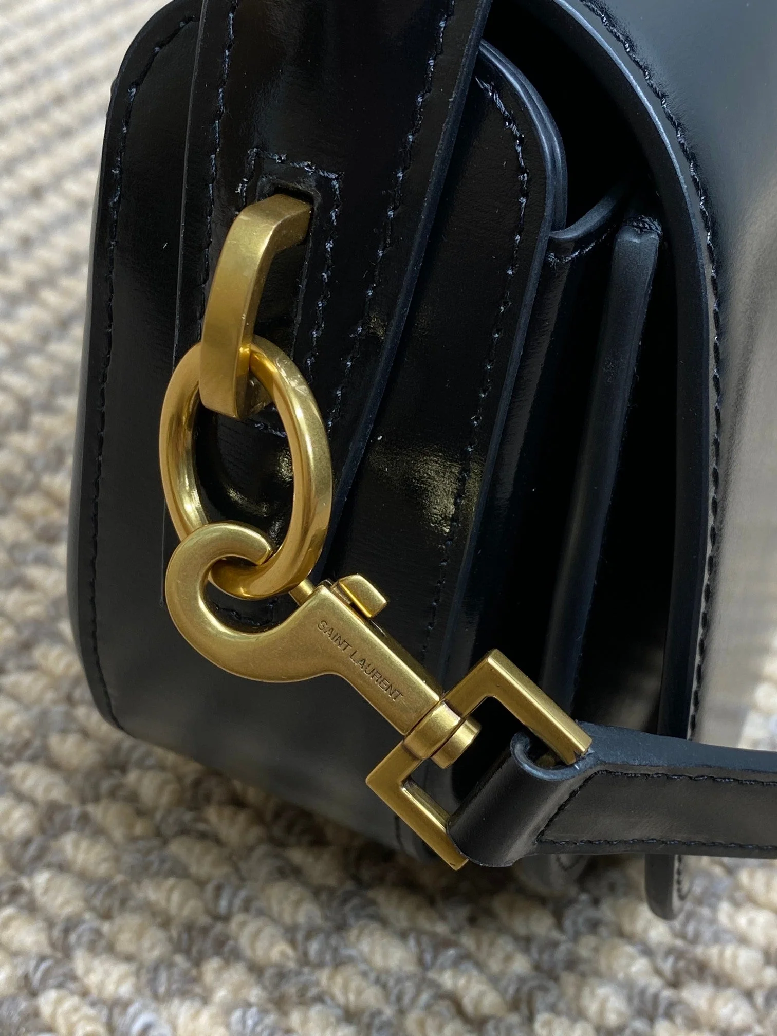 VOLTAIRE HALF-MOON SHOULDER BAG 24 IN BLACK CALFSKIN GOLD METALLIC