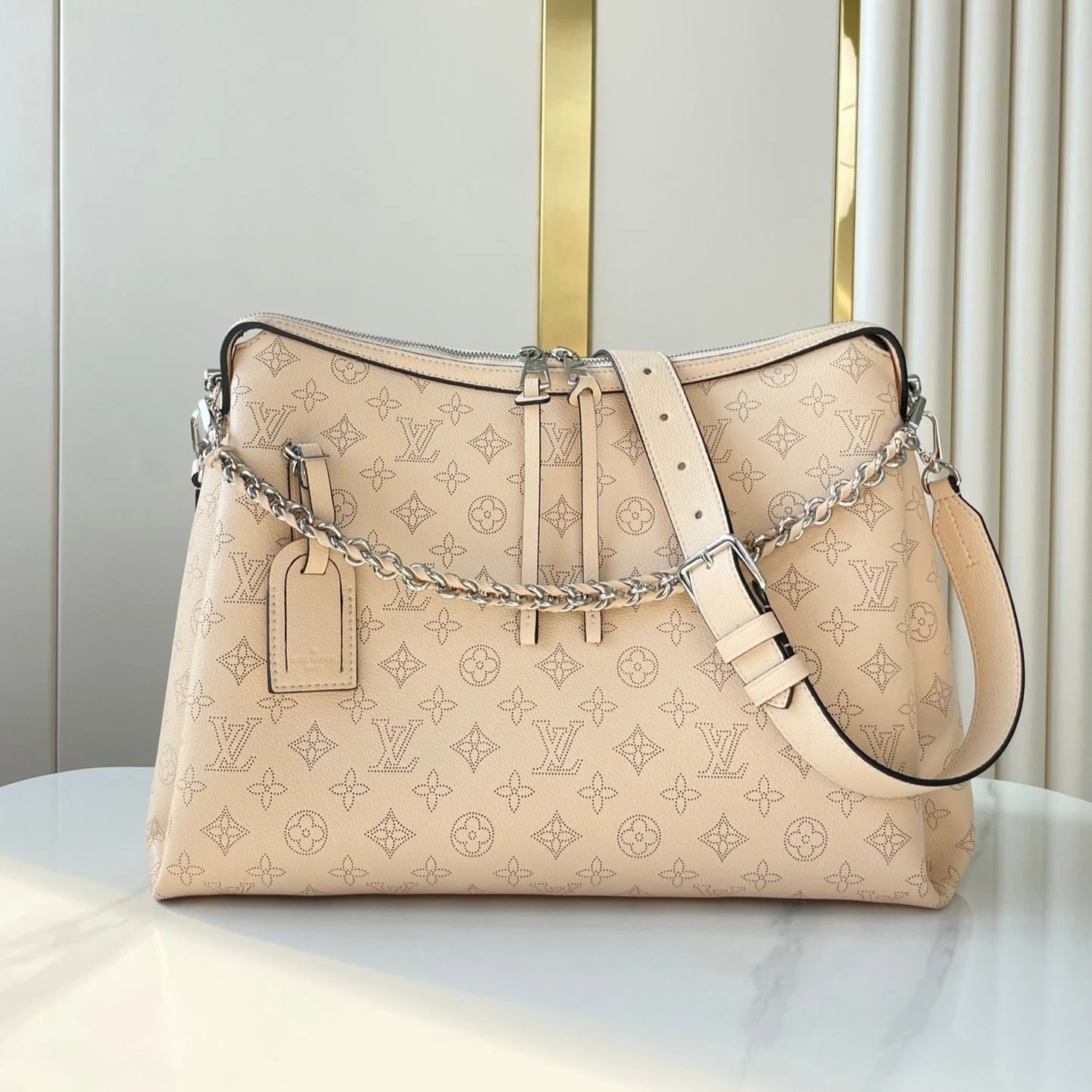 HAND IT ALL MM 32 IN CREAM MONOGRAM PERFORATE CALFSKIN SILVER HARDWARE