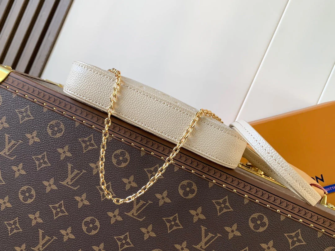 EASY POUCH ON STRAP 19 IN BEIGE MONOGRAM EMPREINTE LEATHER