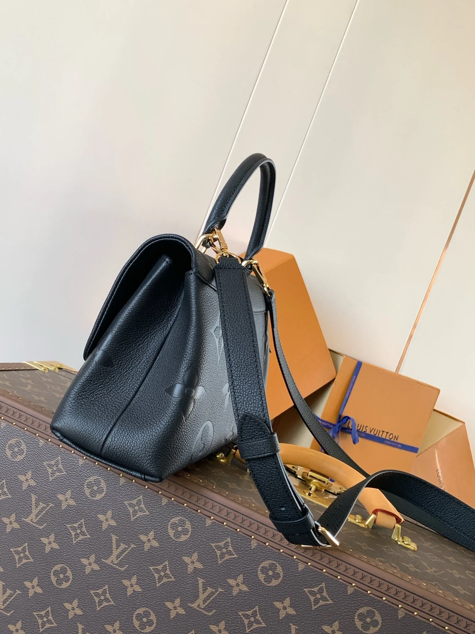 MADELEINE 30 IN BLACK MONOGRAM CALFSKIN EMBOSSED LOGO