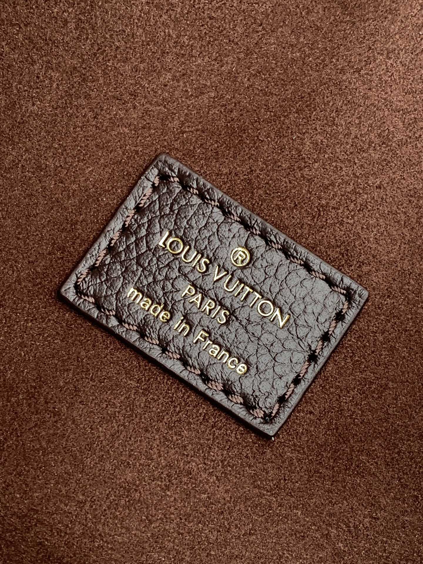 LOOP HOBO 38 IN DARK BROWN MONOGRAM CALFSKIN EMBOSSED LOGO