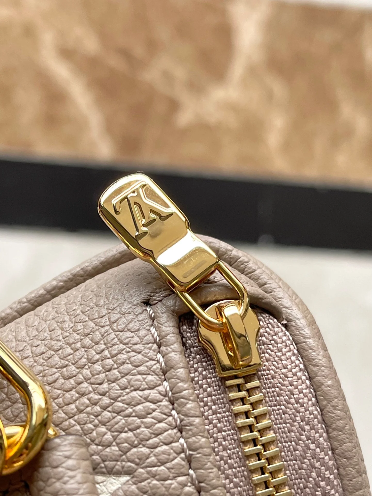 MINI BUMBAG 17 IN TOURTERELLE WHITE MONOGRAM EMPREINTE LEATHER GOLD HARDWARE