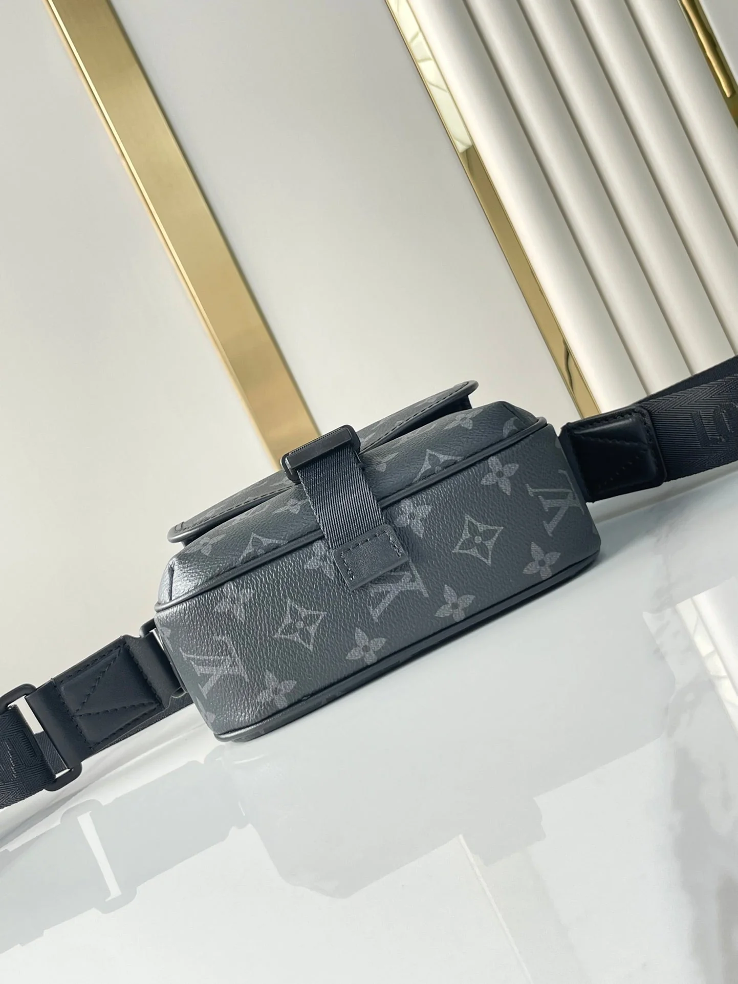 GETAWAY MESSENGER 18 IN GUN METAL MONOGRAM ECLIPSE CANVAS
