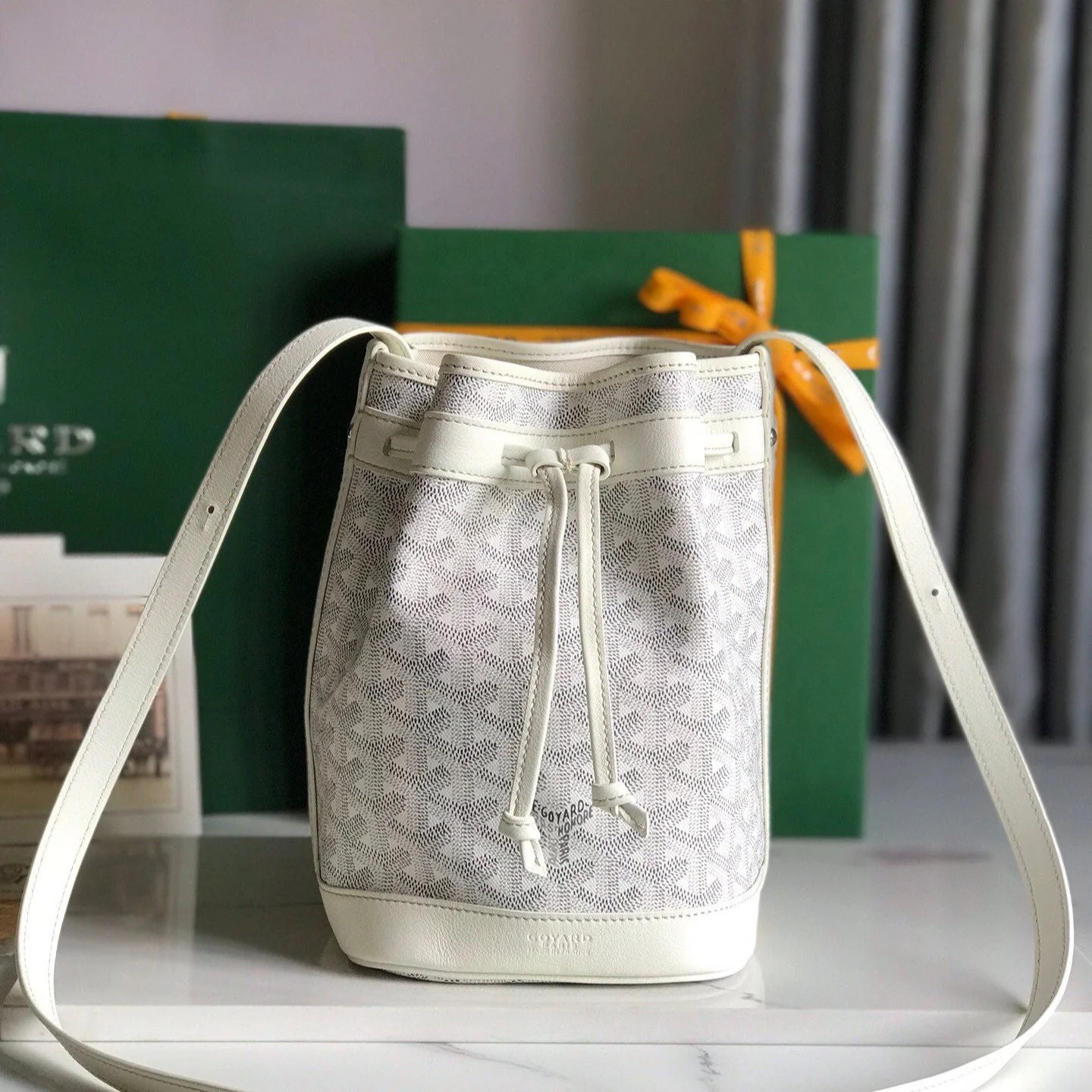 PETIT FLOT BUCKET BAG 22 IN WHITE GOYARDINE CANVAS AND LAMBSKIN TRIM