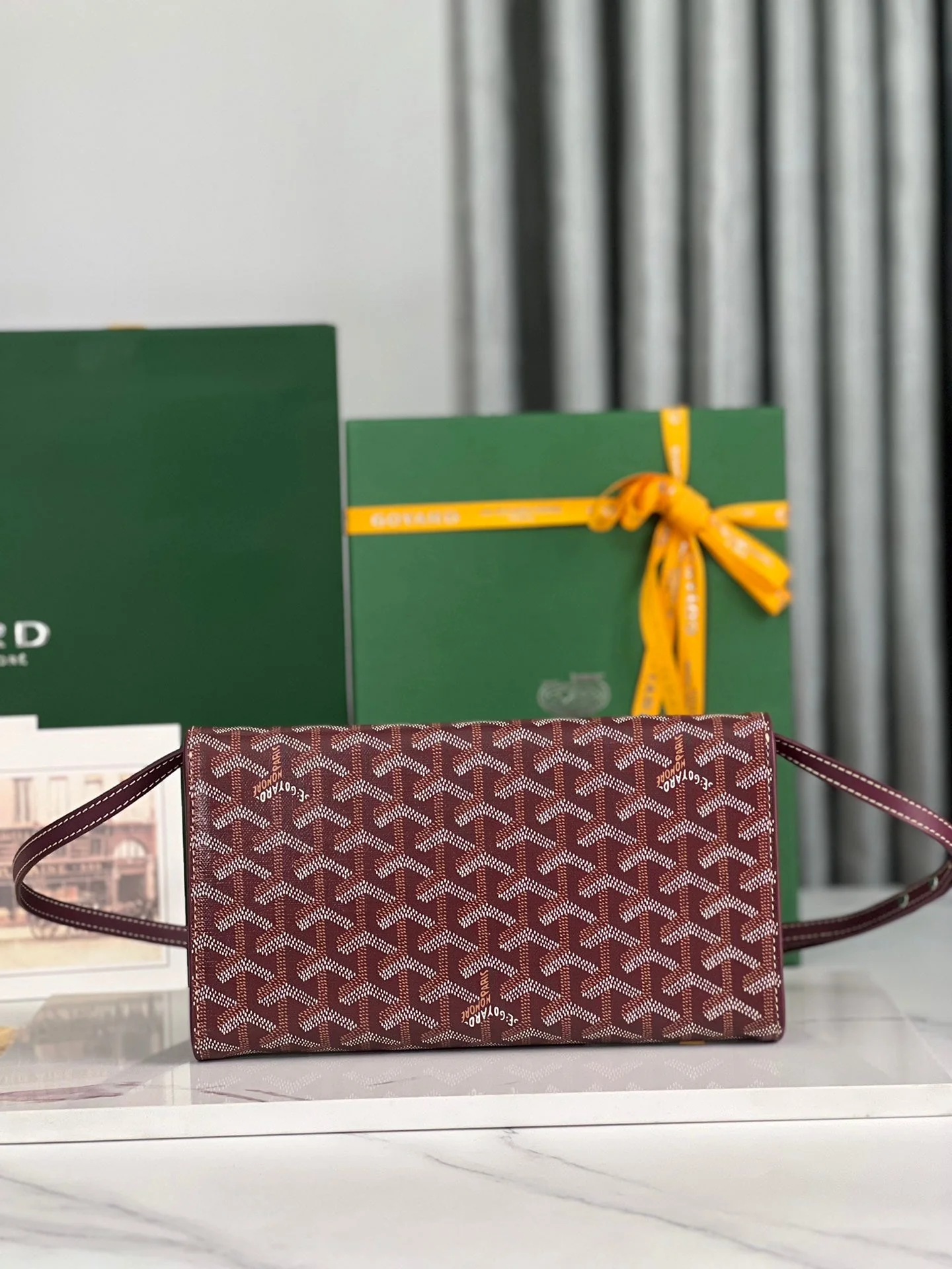 MONTE-CARLO PM CLUTCH 25 IN WINE RED GOYARDINE CANVAS