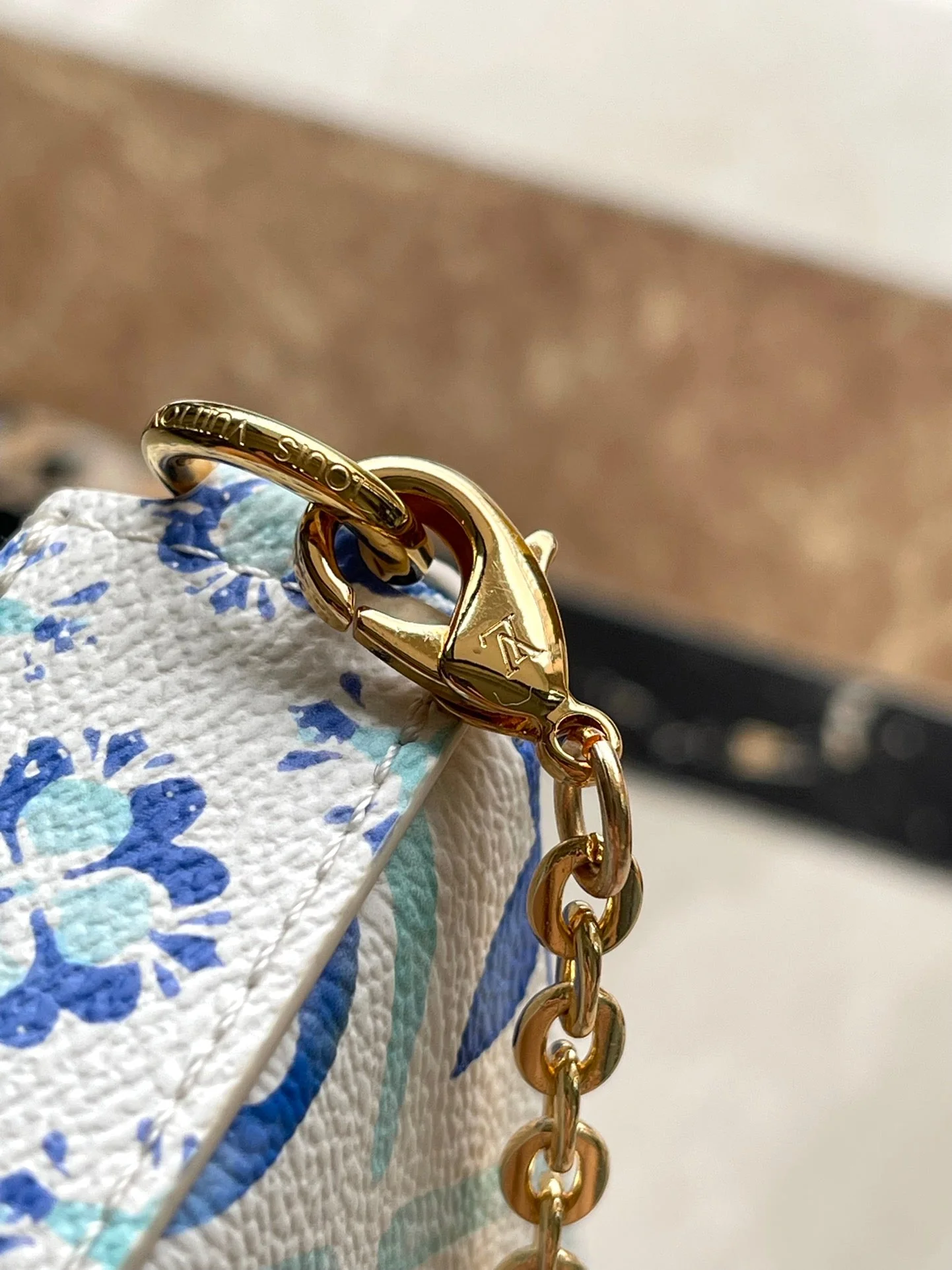 FÉLICIE POCHETTE 21 IN LAGOON BLUE MONOGRAM TILES CANVAS