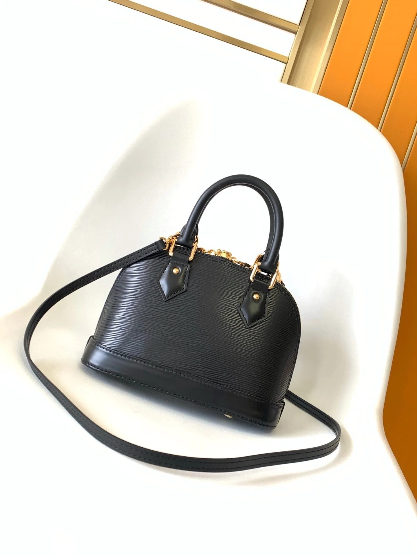 LV 25S ALMA BB BAG 23 IN BLACK EPI CALFSKIN GOLD HARDWARE