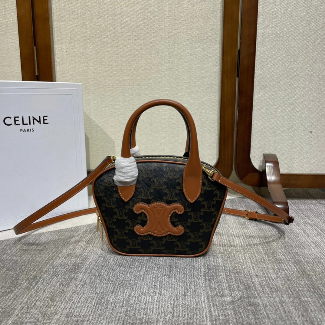 TOP HANDLE BAG 20 IN BLACK TRIOMPHE CANVAS AND BROWN CALFSKIN