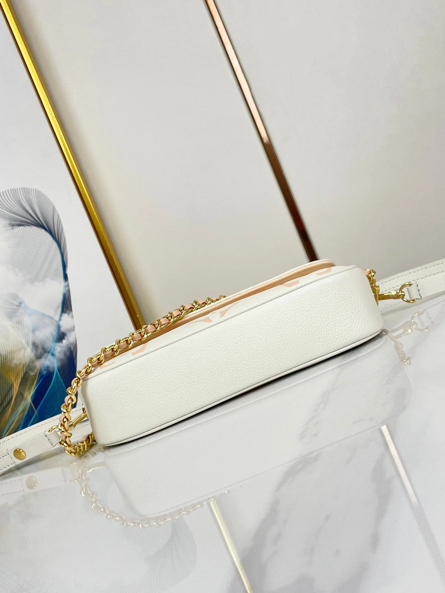 WALLET ON CHAIN IVY 23 IN WHITE PINK MONOGRAM EMPREINTE LEATHER