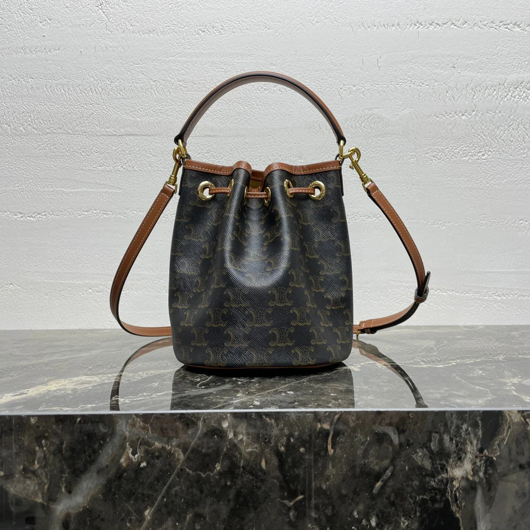 CLARA BAG 19 IN BLACK TRIOMPHE CANVAS AND BROWN CALFSKIN TRIM