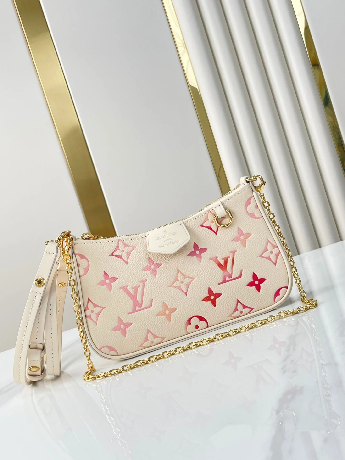 EASY POUCH ON STRAP 19 IN SUNRISE AQUARELLE MONOGRAM EMPREINTE LEATHER GOLD CHAIN