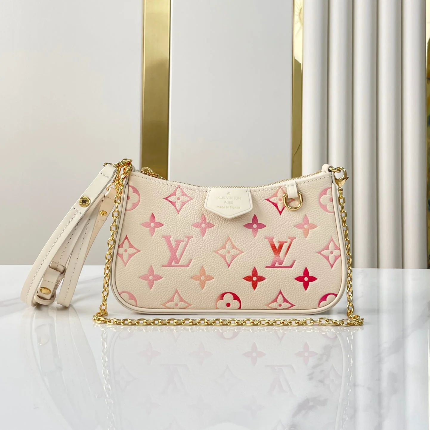 EASY POUCH ON STRAP 19 IN SUNRISE AQUARELLE MONOGRAM EMPREINTE LEATHER GOLD CHAIN