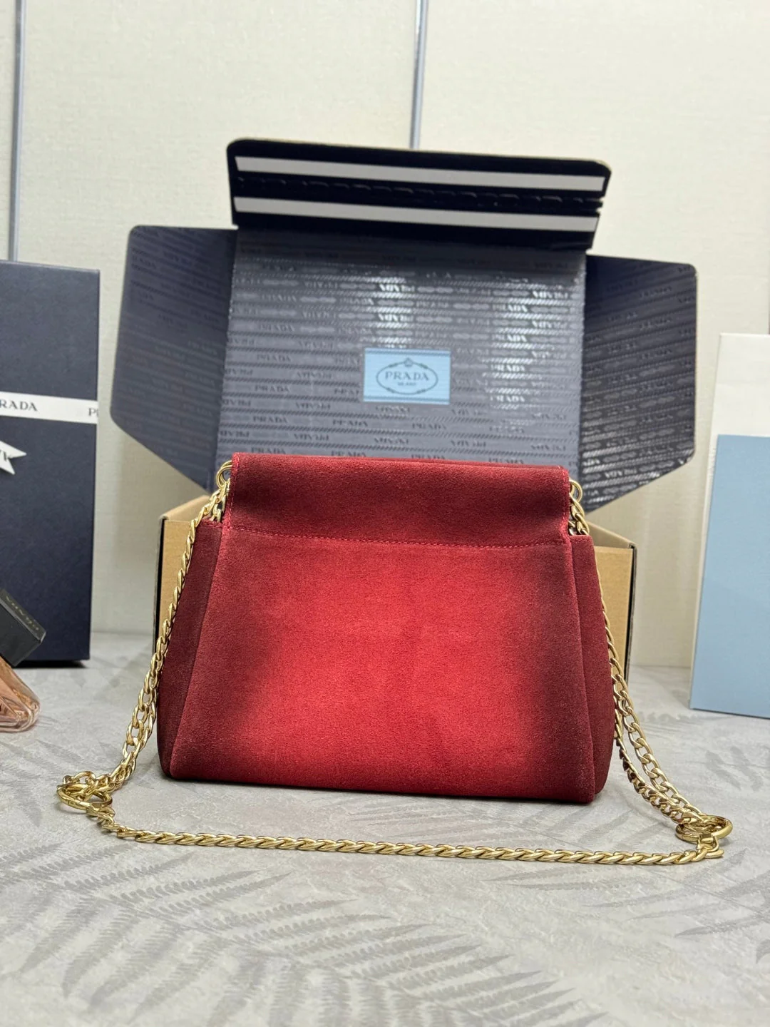 PRADA 25S ENCHAINE MINI BAG 22 IN RUBY RED SUEDE GOLD HARDWRE