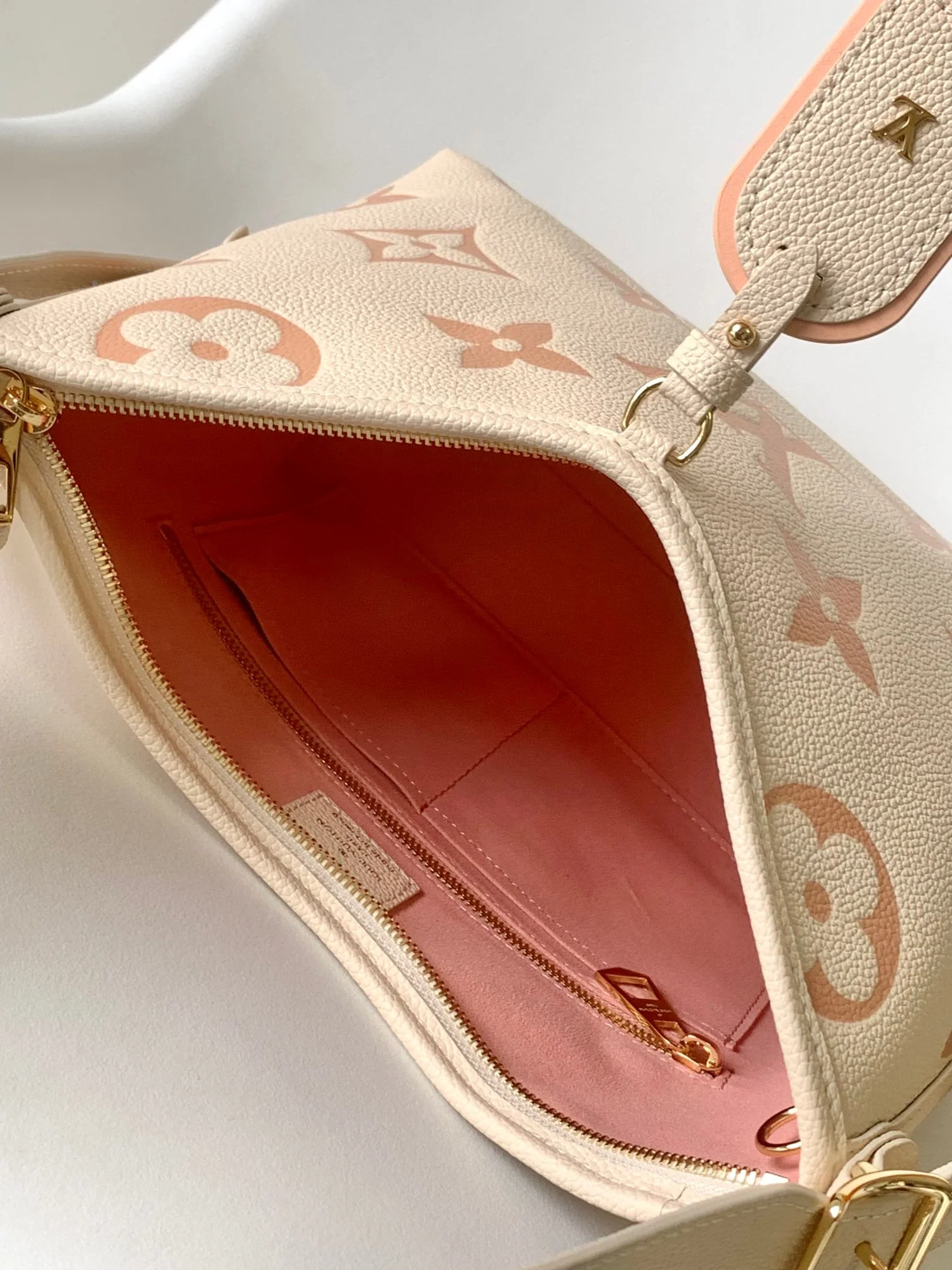 CARRYALL PM 29 BAG IN BEIGE MIX PINK MONOGRAM EMPREINTE LEATHER