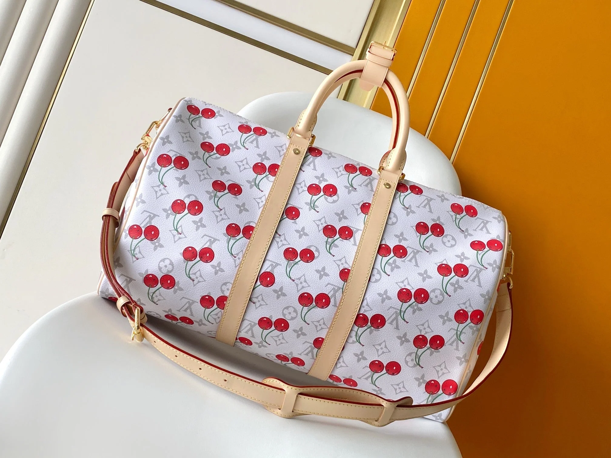 KEEPALL BANDOULIÈRE 45 IN WHITE AND RED CALFSKIN
