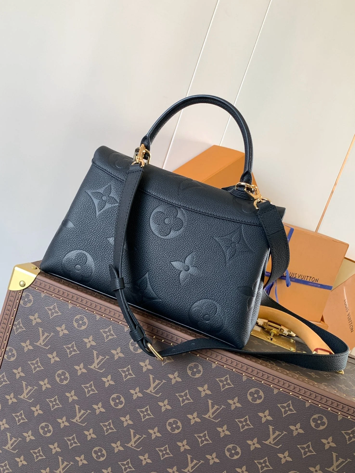 MADELEINE 30 IN BLACK MONOGRAM CALFSKIN EMBOSSED LOGO