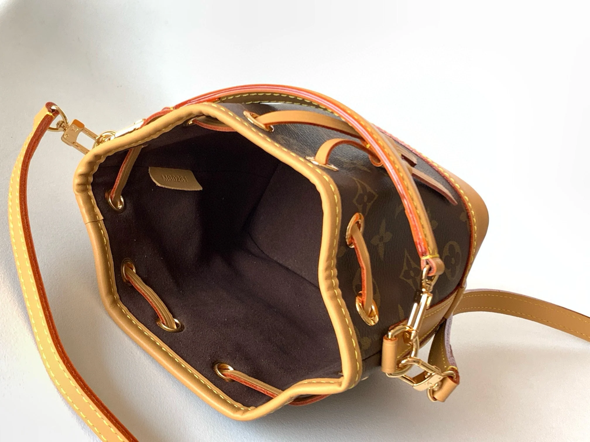 NANO NOÉ 16 IN BROWN MONOGRAM CALFSKIN