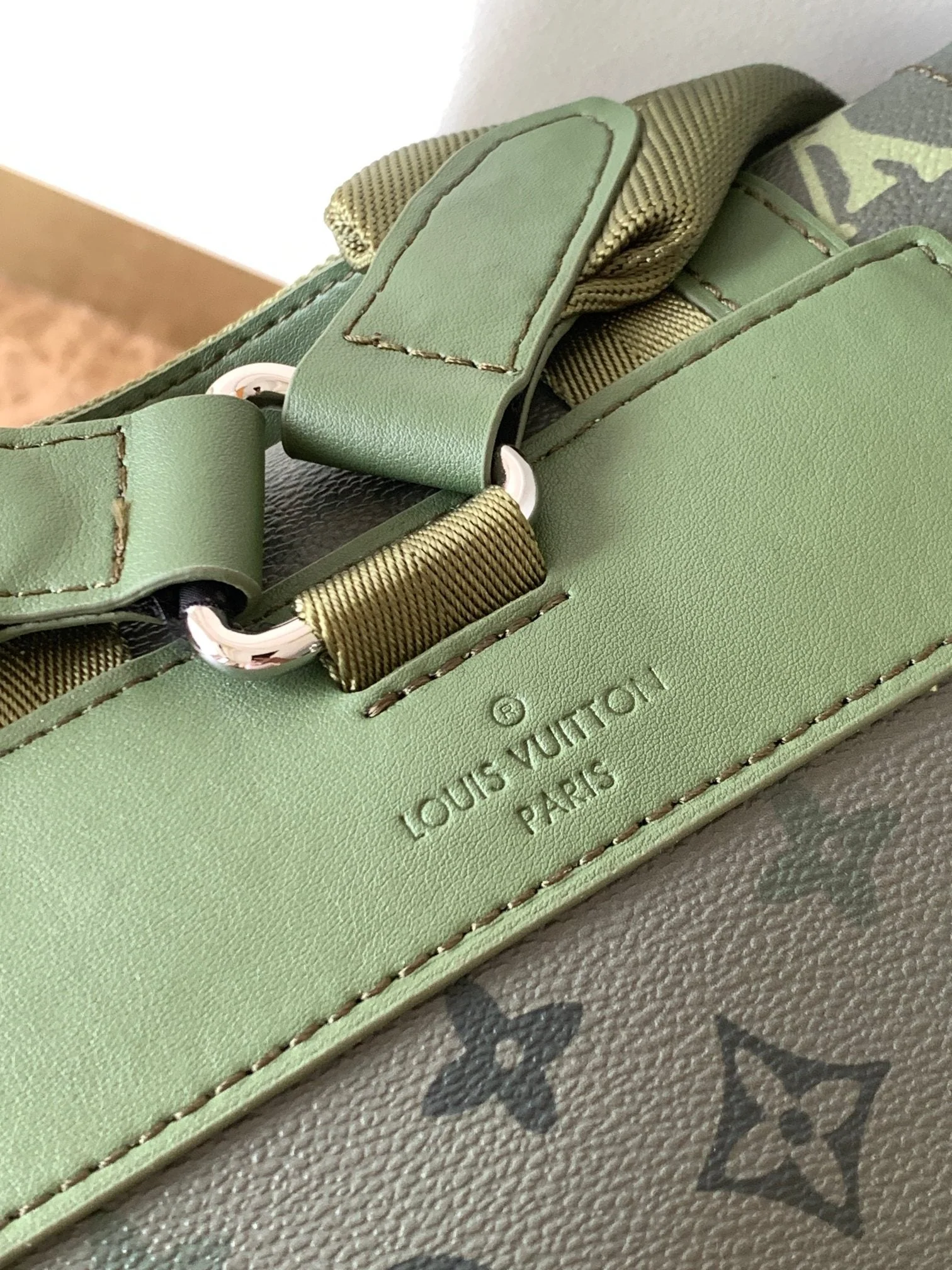 LV 25S CHRISTOPHER BACKPACK 48 IN ARMY GREEN CALFSKIN SILVER HARDWARE