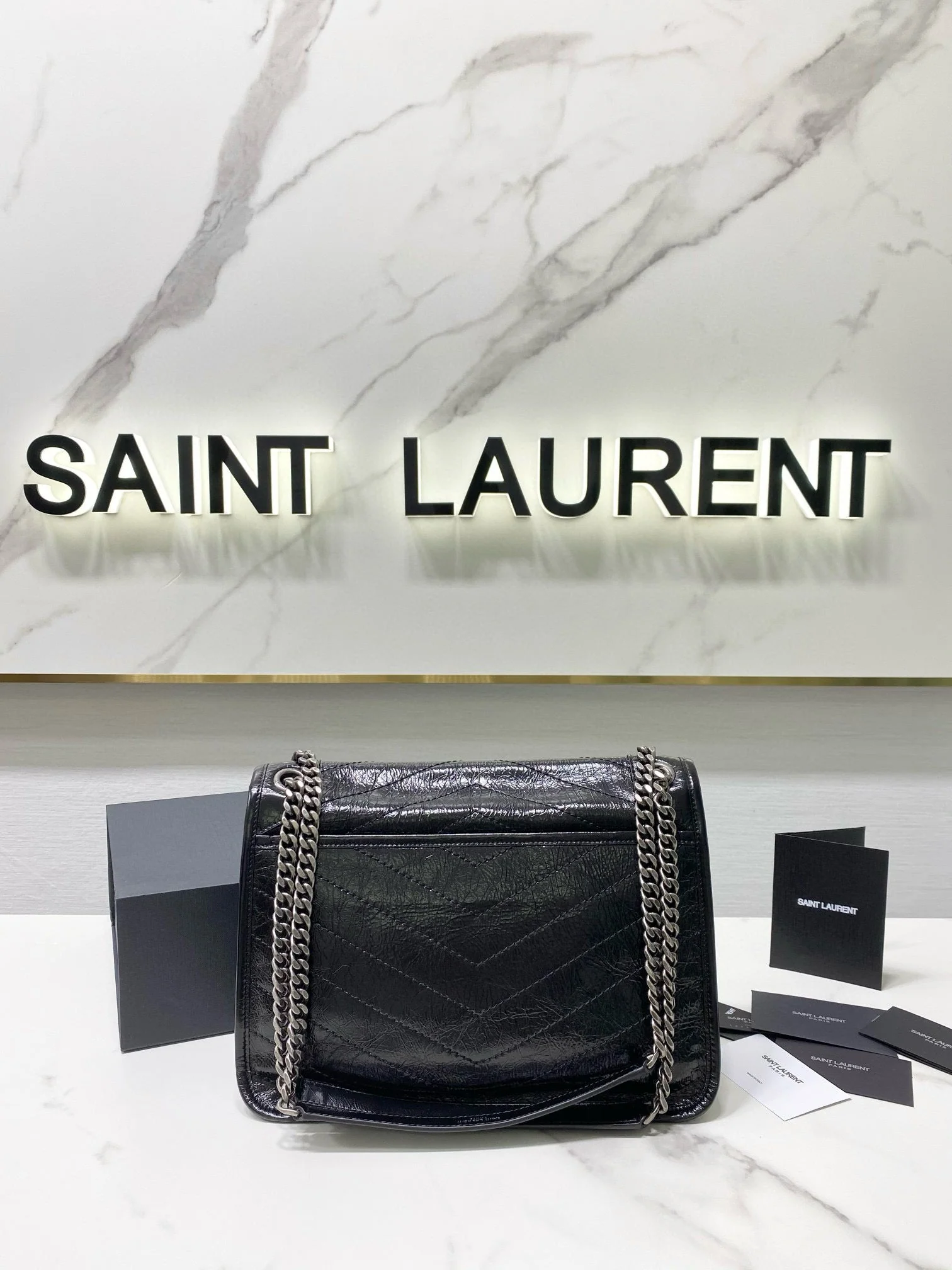 MEDIUM NIKI 28 IN BLACK CALFSKIN CHAIN BAG High-end