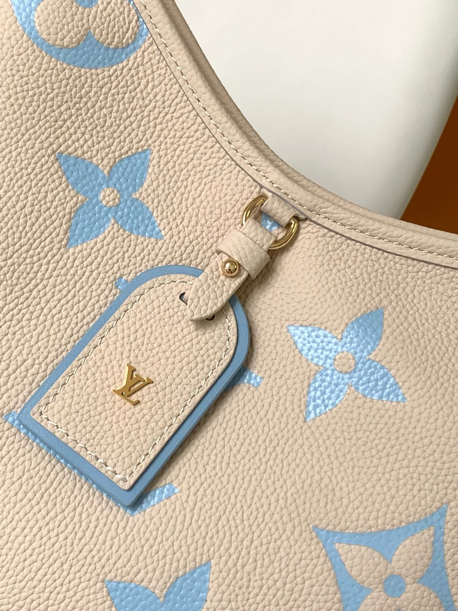 CARRYALL PM 29 BAG IN BEIGE MIX BLUE MONOGRAM EMPREINTE LEATHER