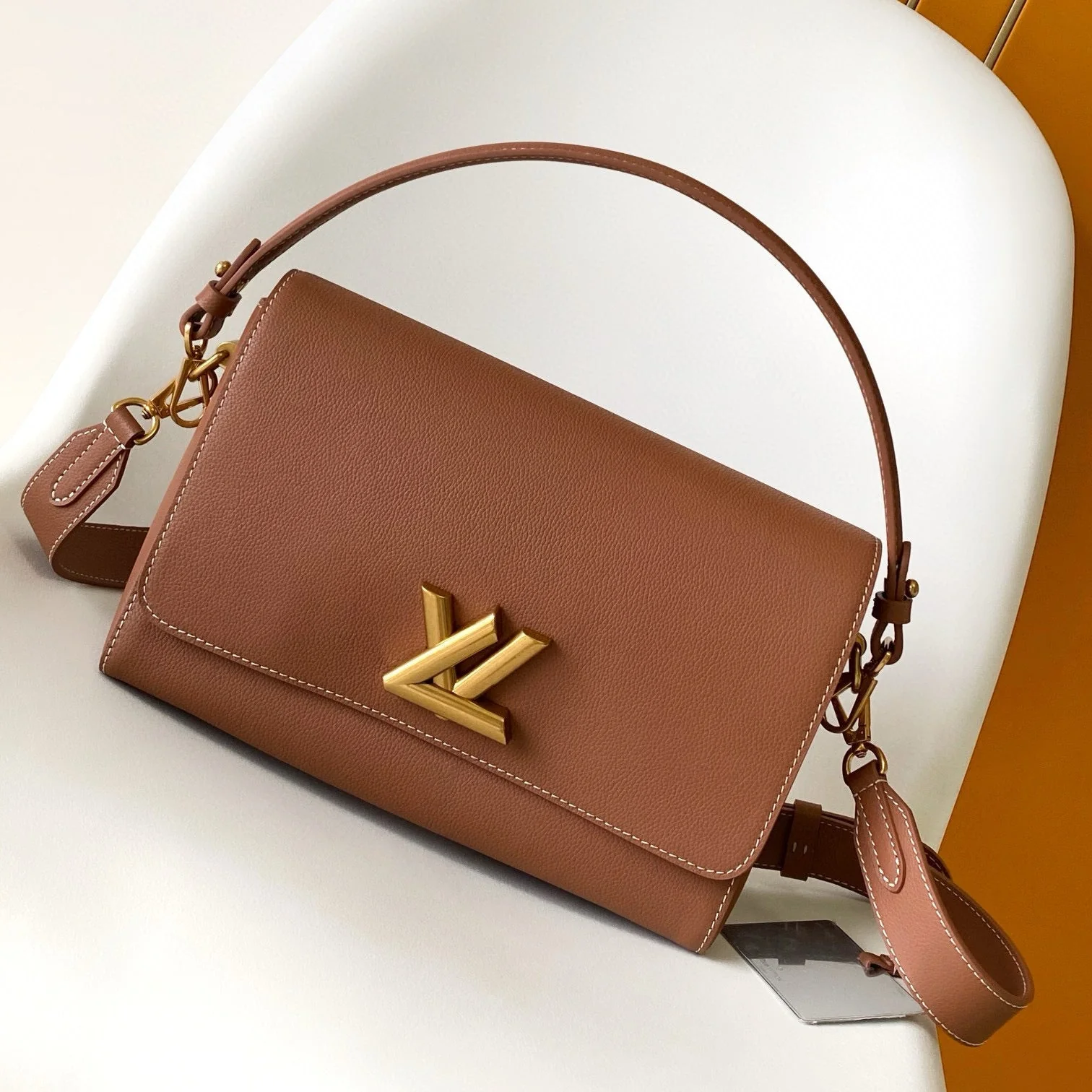 SOFT TWIST 27 IN COGNAC CALFSKIN GOLD LOGO