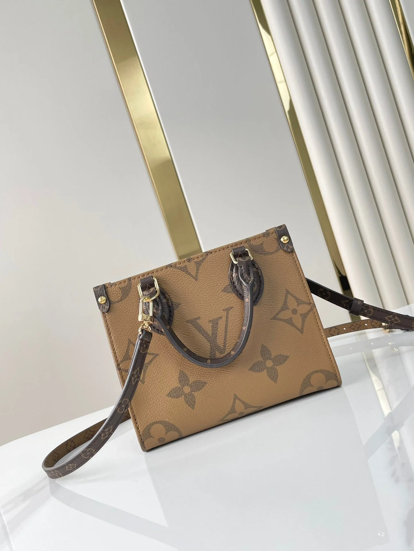 ONTHEGO BB 18 IN BROWN MONOGRAM AND MONOGRAM REVERSE CANVAS