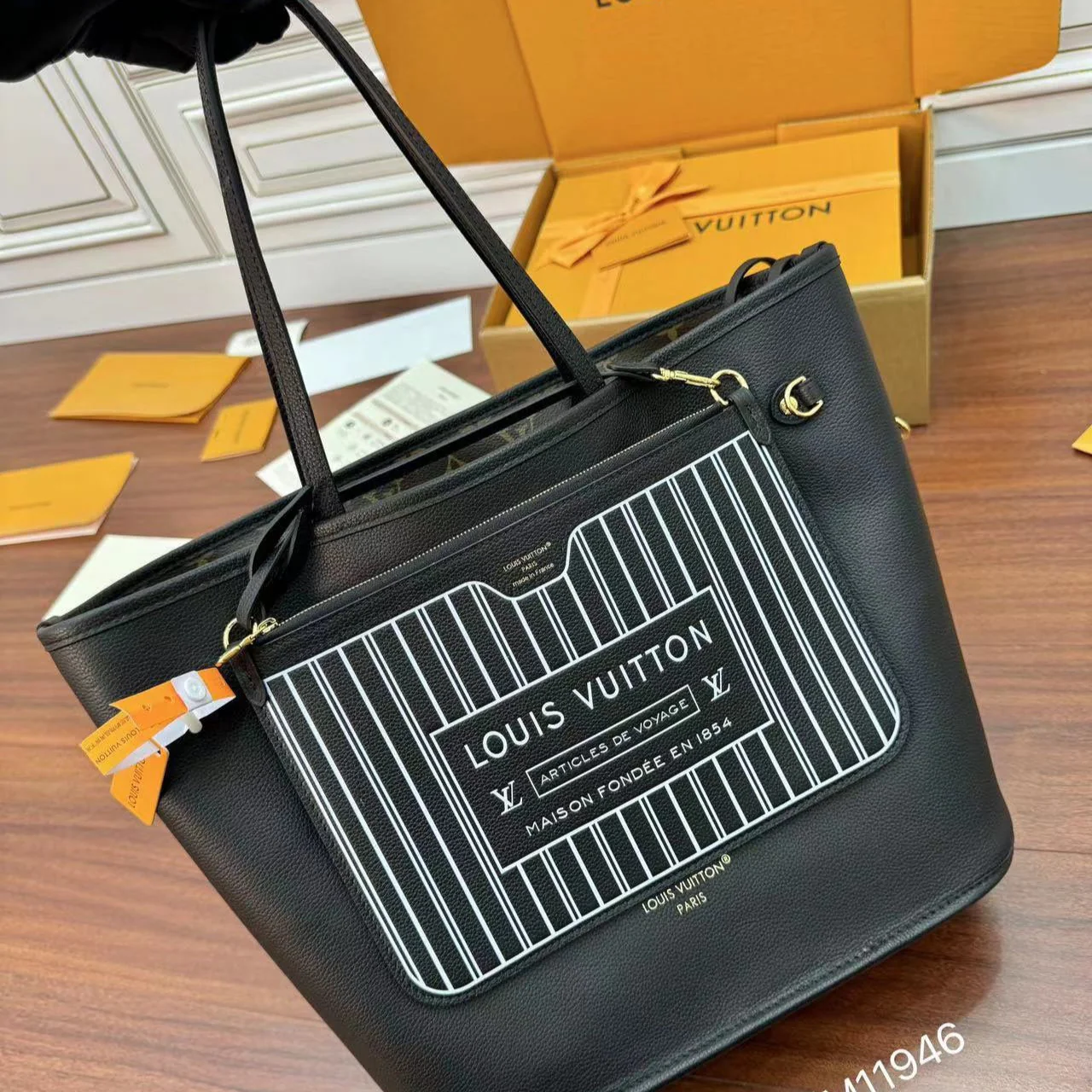 NEVERFULL INSIDE OUT MM BAG 31 IN BROWN MONOGRAM COATED CANVAS AND CALFSKIN