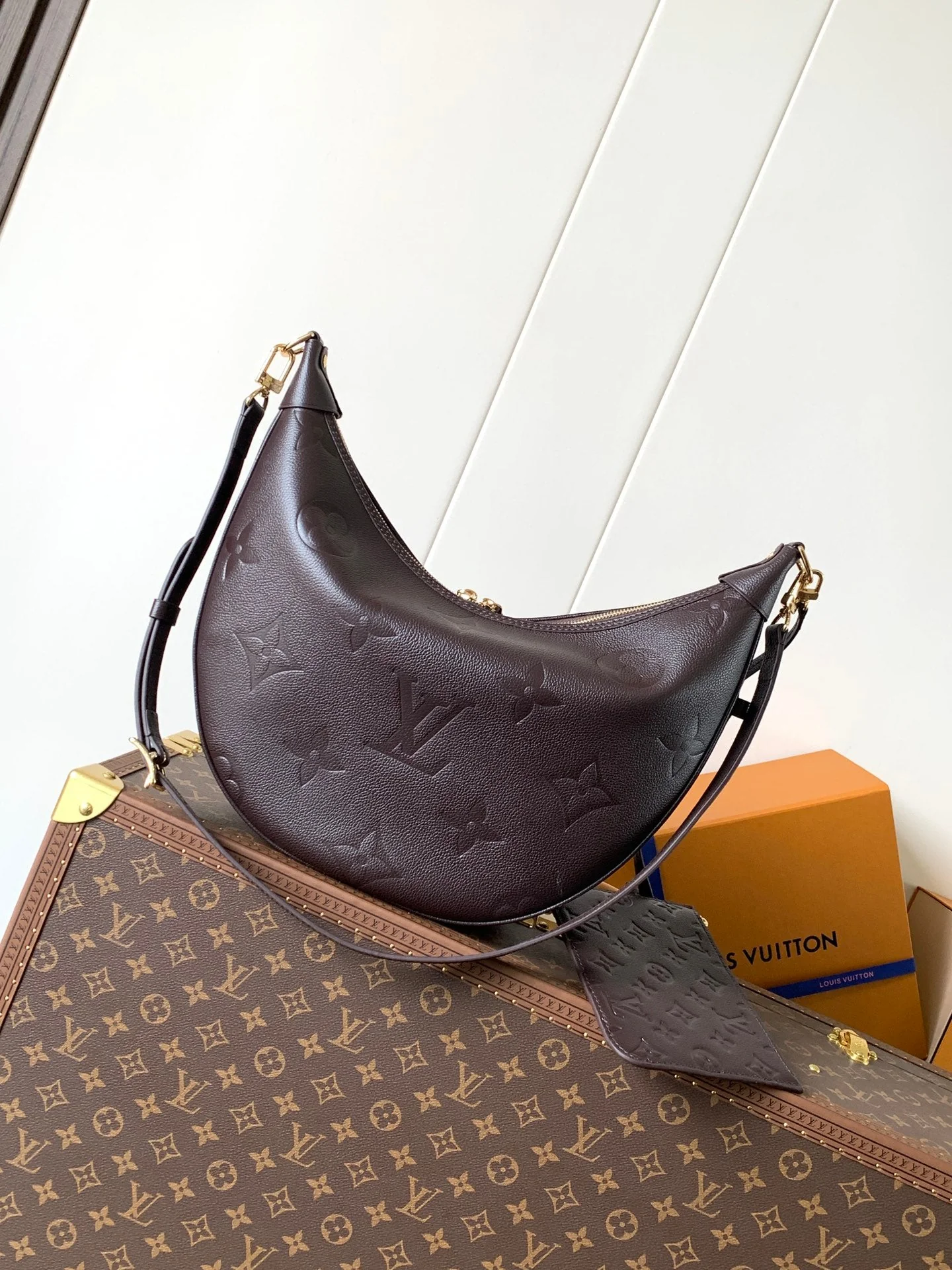 LOOP HOBO 38 IN DARK BROWN MONOGRAM CALFSKIN EMBOSSED LOGO