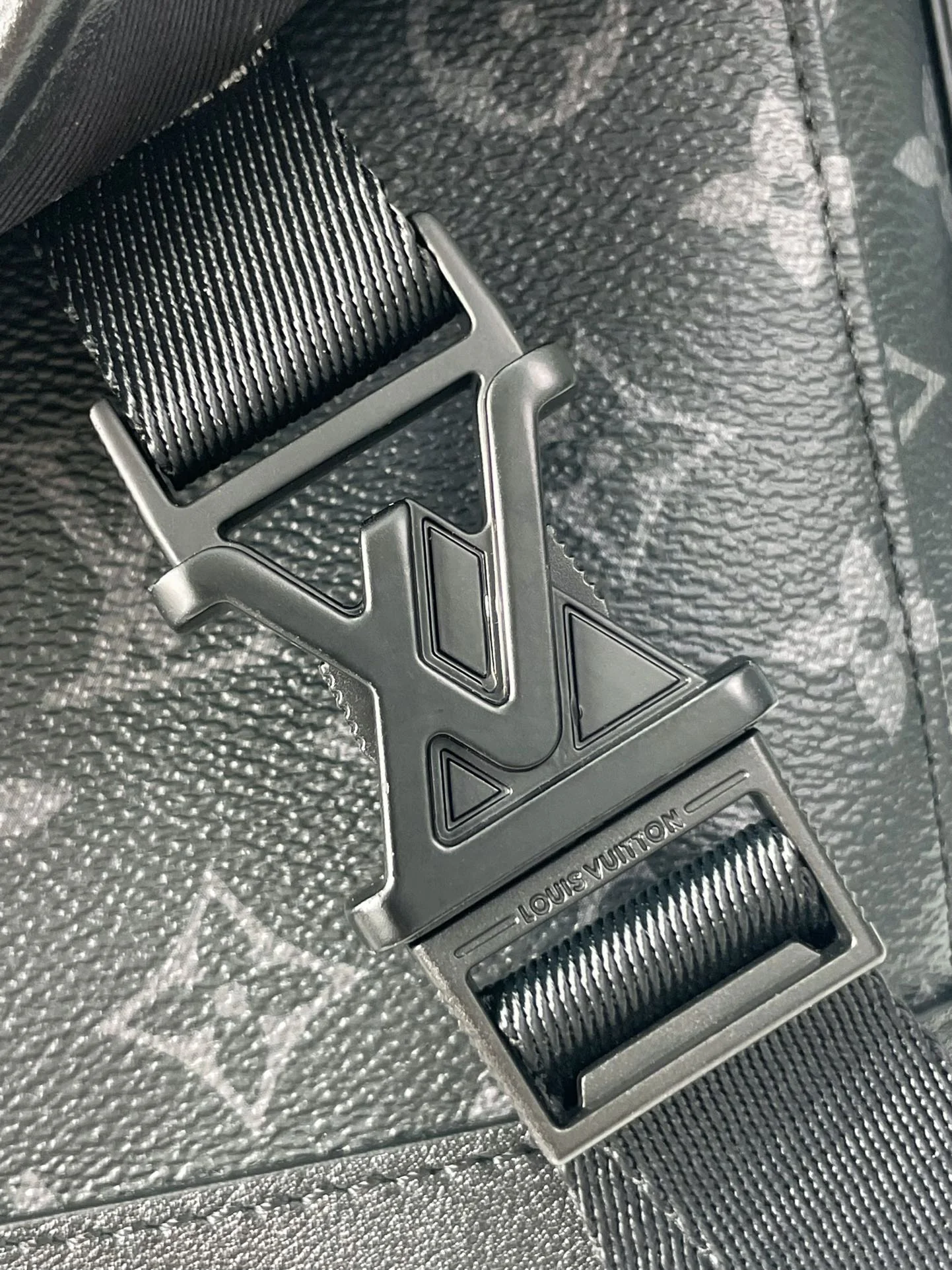 MESSENGER VOYAGER PM 33 IN GUN METAL MONOGRAM ECLIPSE CANVAS