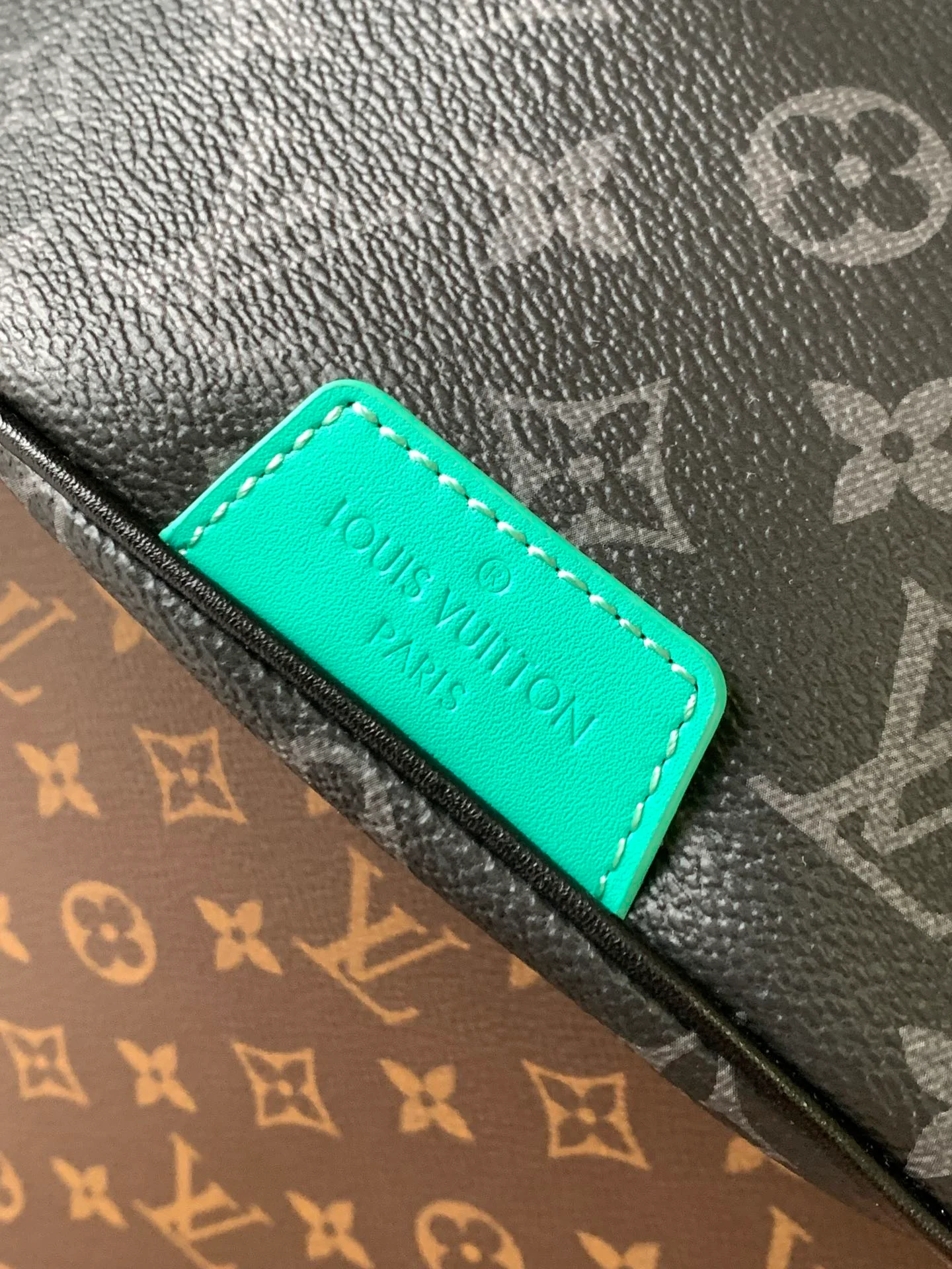 LV 25S DISCOVERY BUMBAG 44 IN BLACK AQUA MONOGRAM ECLIPSE CANVAS AND CALFSKIN