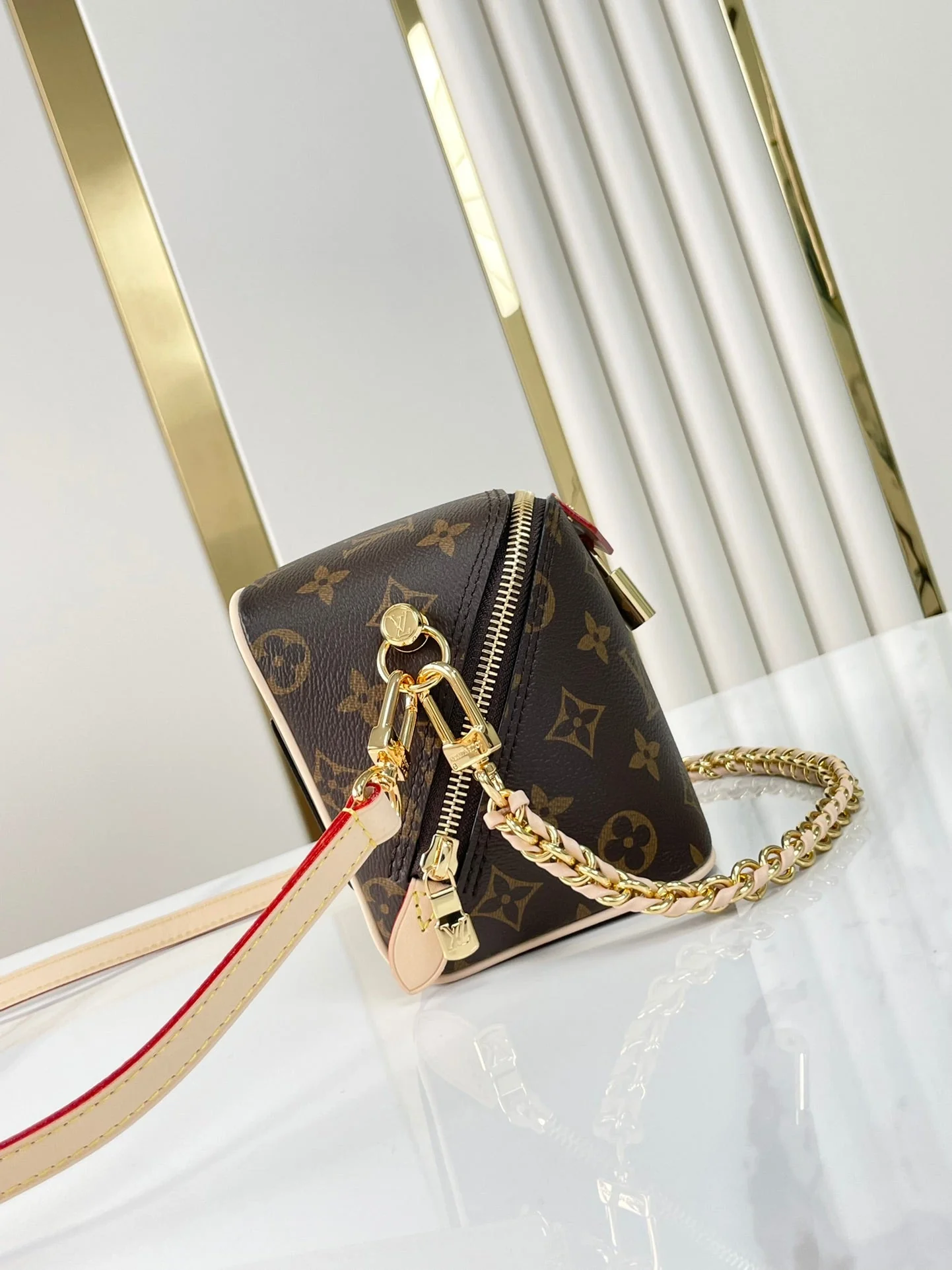 JUST IN CASE 14 IN BROWN MONOGRAM CANVAS GOLD HARDWARE