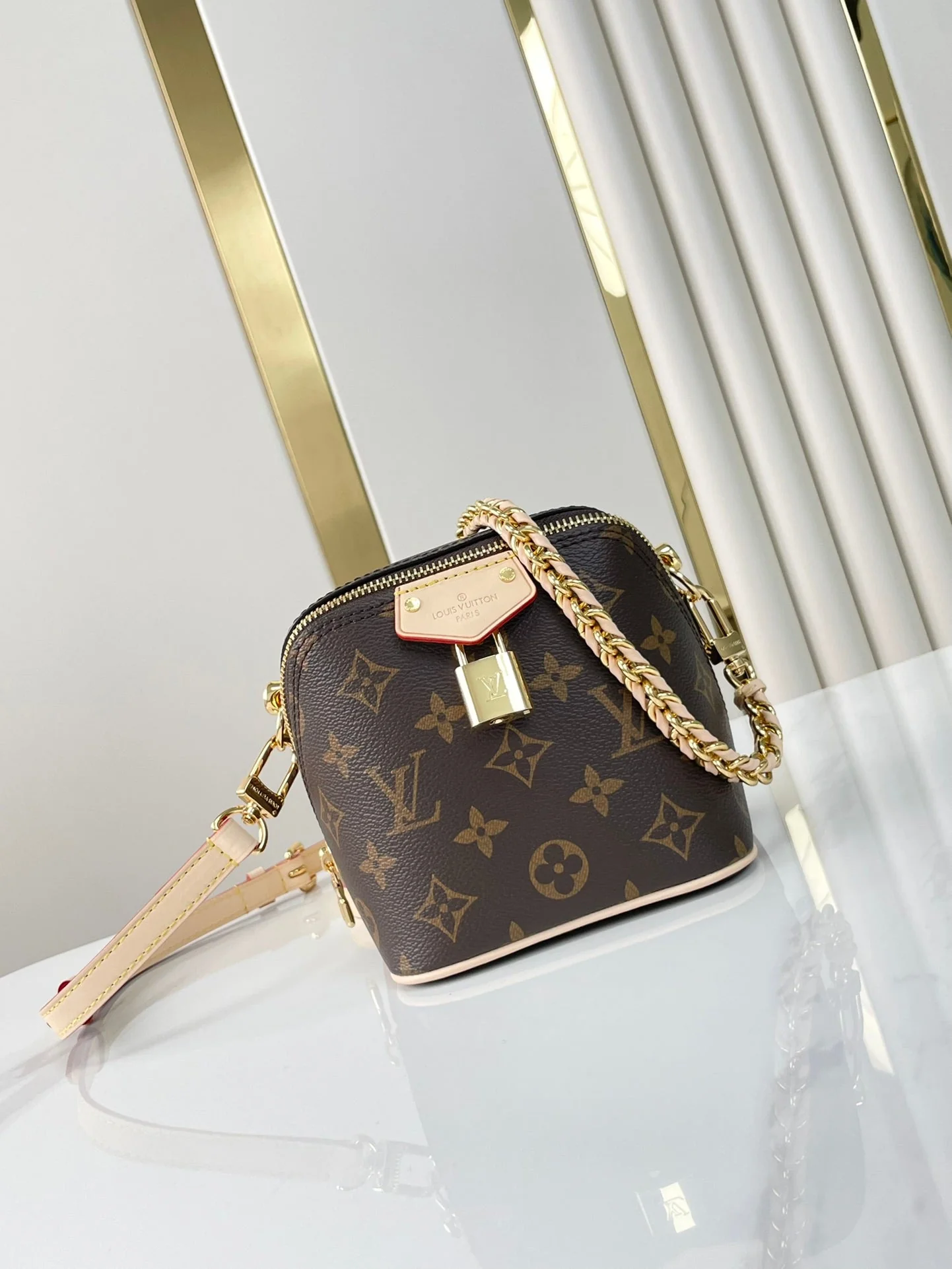 JUST IN CASE 14 IN BROWN MONOGRAM CANVAS GOLD HARDWARE