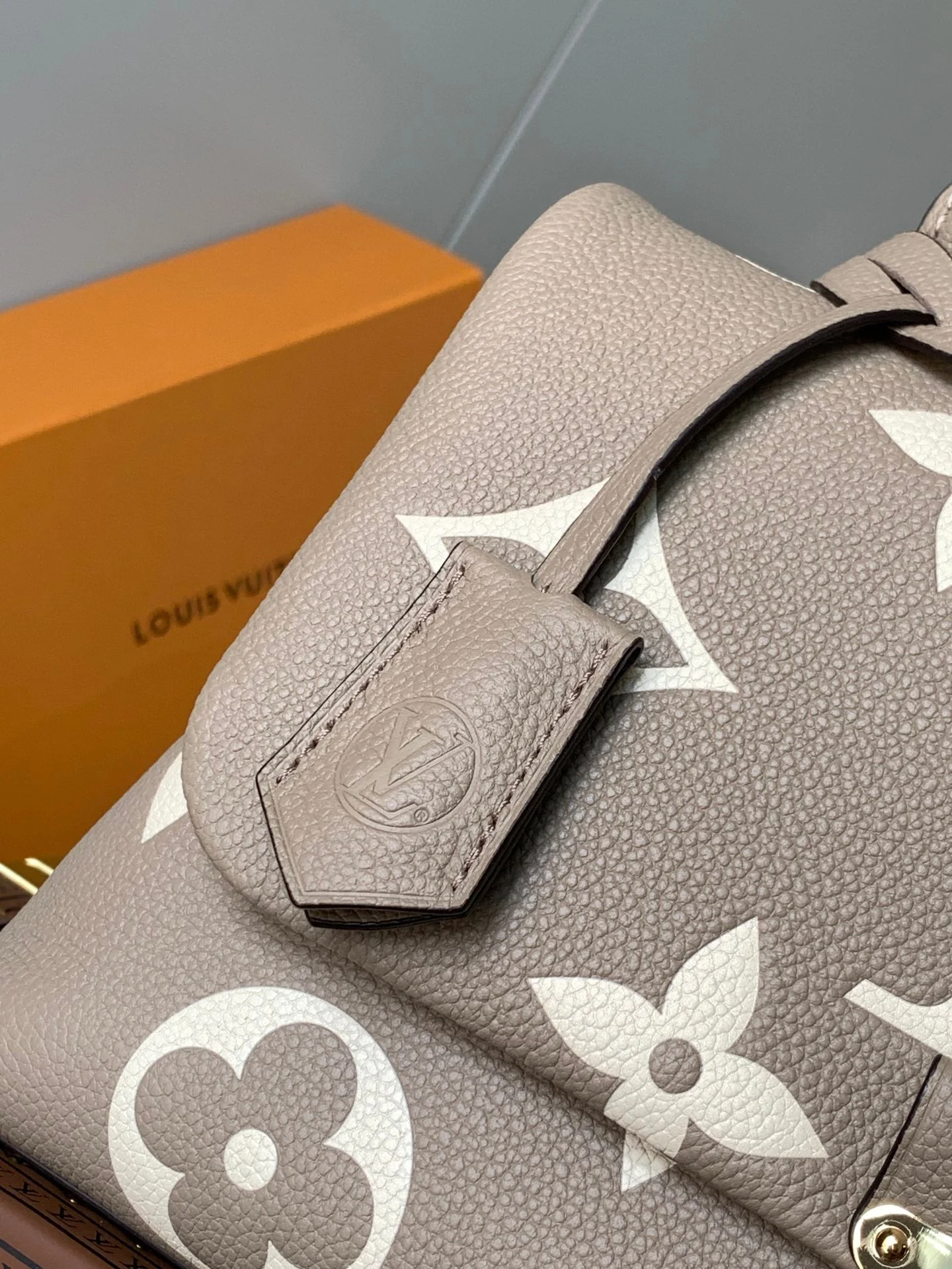 MADELEINE 30 IN BEIGE MONOGRAM CALFSKIN EMBOSSED LOGO