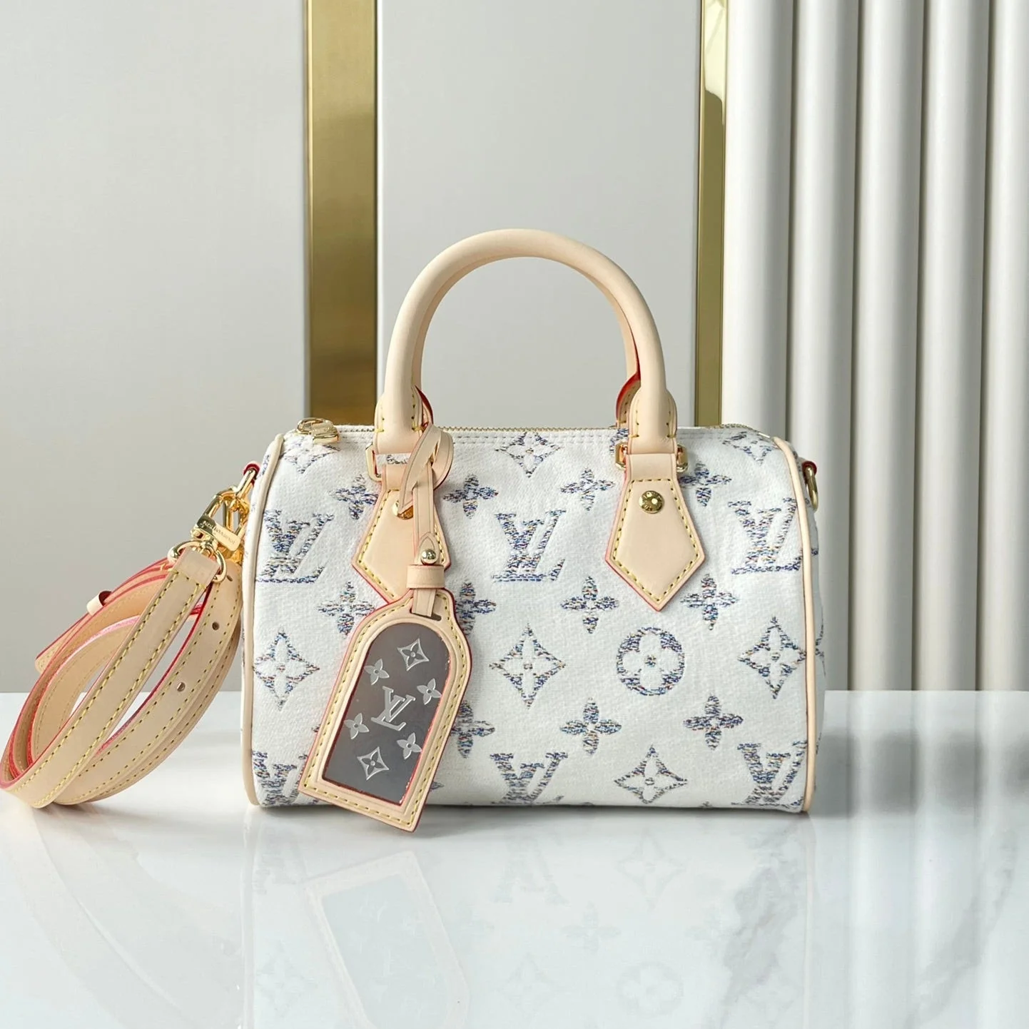 SPEEDY BANDOULIÈRE 20 IN WHITE MONOGRAM JACQUARD FABRIC AND BEIGE CALFSKIN TRIM
