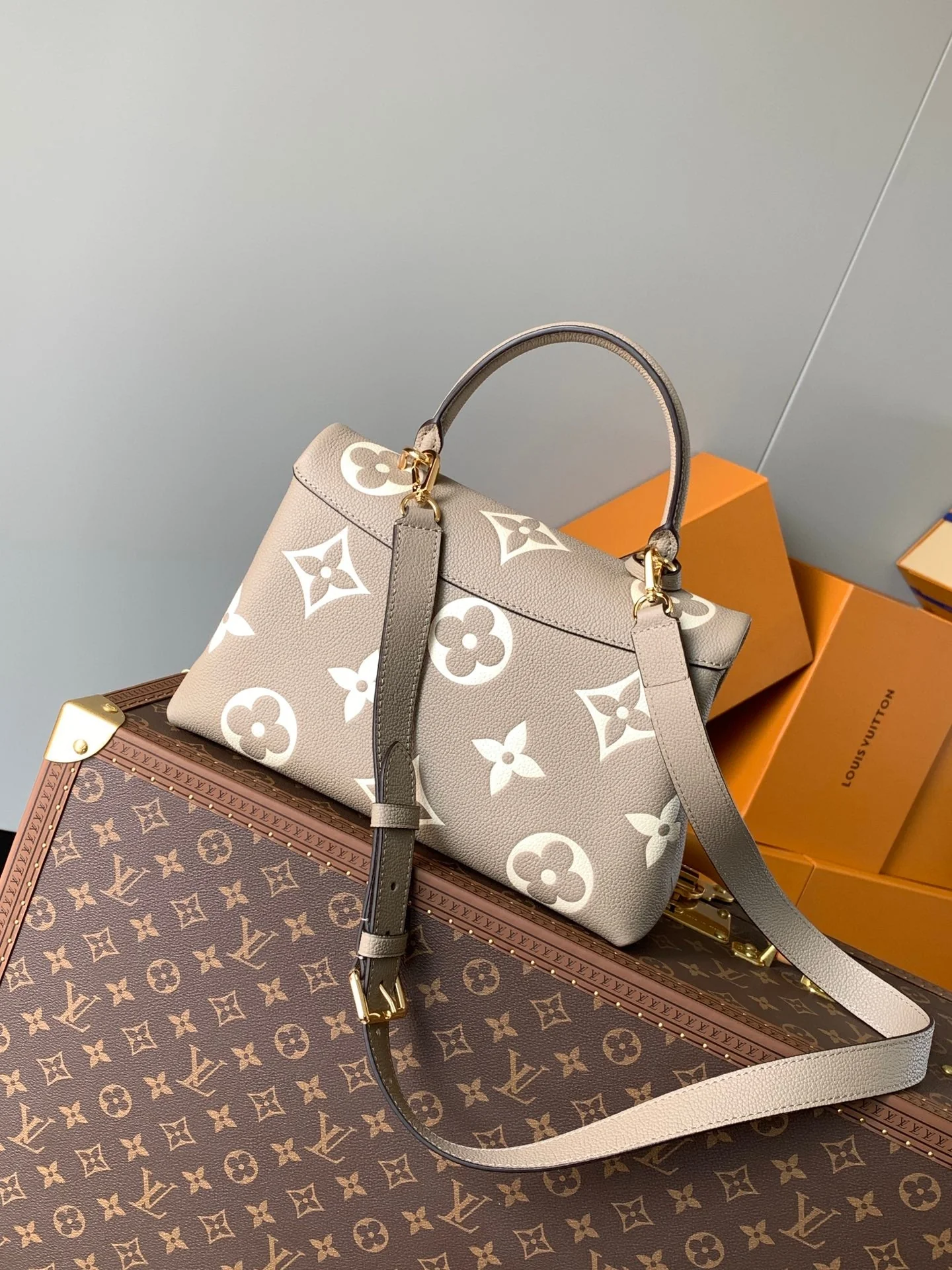 MADELEINE 30 IN BEIGE MONOGRAM CALFSKIN EMBOSSED LOGO