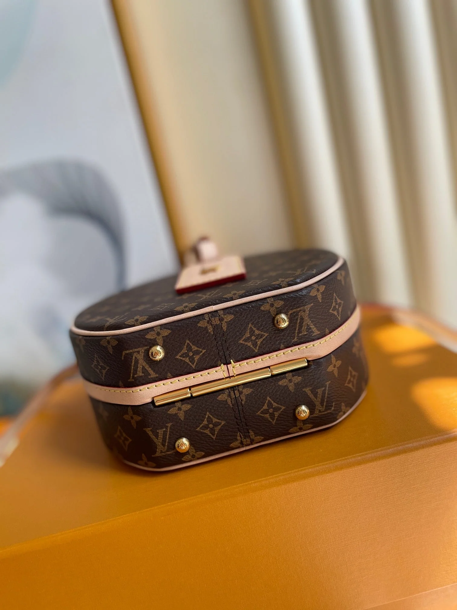 LV 25S PETITE BOITE CHAPEAU 17 IN BROWN MONOGRAM COATED CALFSKIN
