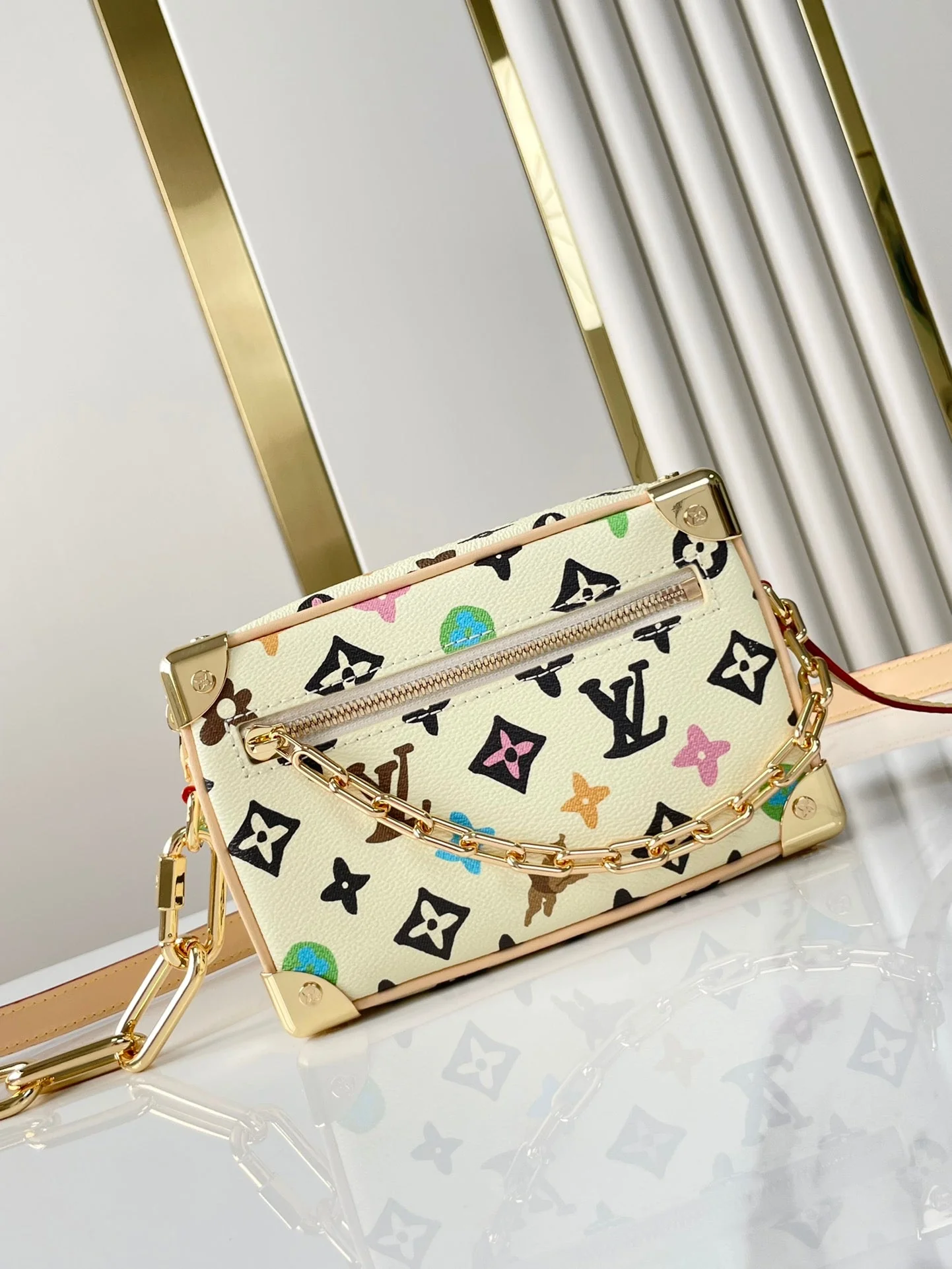 MINI SOFT TRUNK 18 IN VANILLA MONOGRAM CRAGGY CANVAS GOLD CHAIN